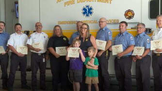 The family of a 7-year-old boy who nearly died after choking on a piece of meat reunited Monday with the first responders who helped save his life last month in Anne Arundel County.