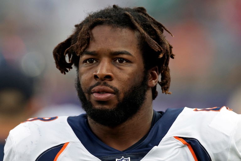 Denver Broncos linebacker Andre Mintze (48) walks on the field against the New York Giants during an NFL football game, Sunday, Sept. 12, 2021, in East Rutherford, N.J.