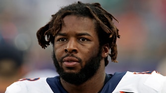 Denver Broncos linebacker Andre Mintze (48) walks on the field against the New York Giants during an NFL football game, Sunday, Sept. 12, 2021, in East Rutherford, N.J.
