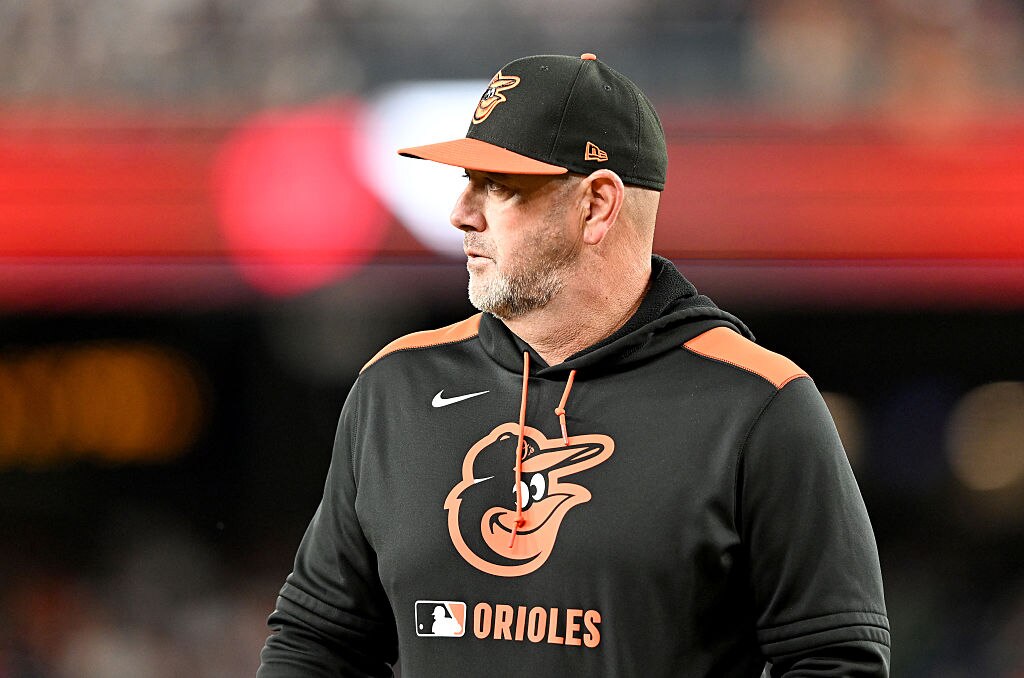 WASHINGTON, DC - APRIL 22: Brandon Hyde #18 of the Baltimore Orioles walks to the dugout after a pitching change in the sixth inning against the Washington Nationals at Nationals Park on April 22, 2025 in Washington, D.C.