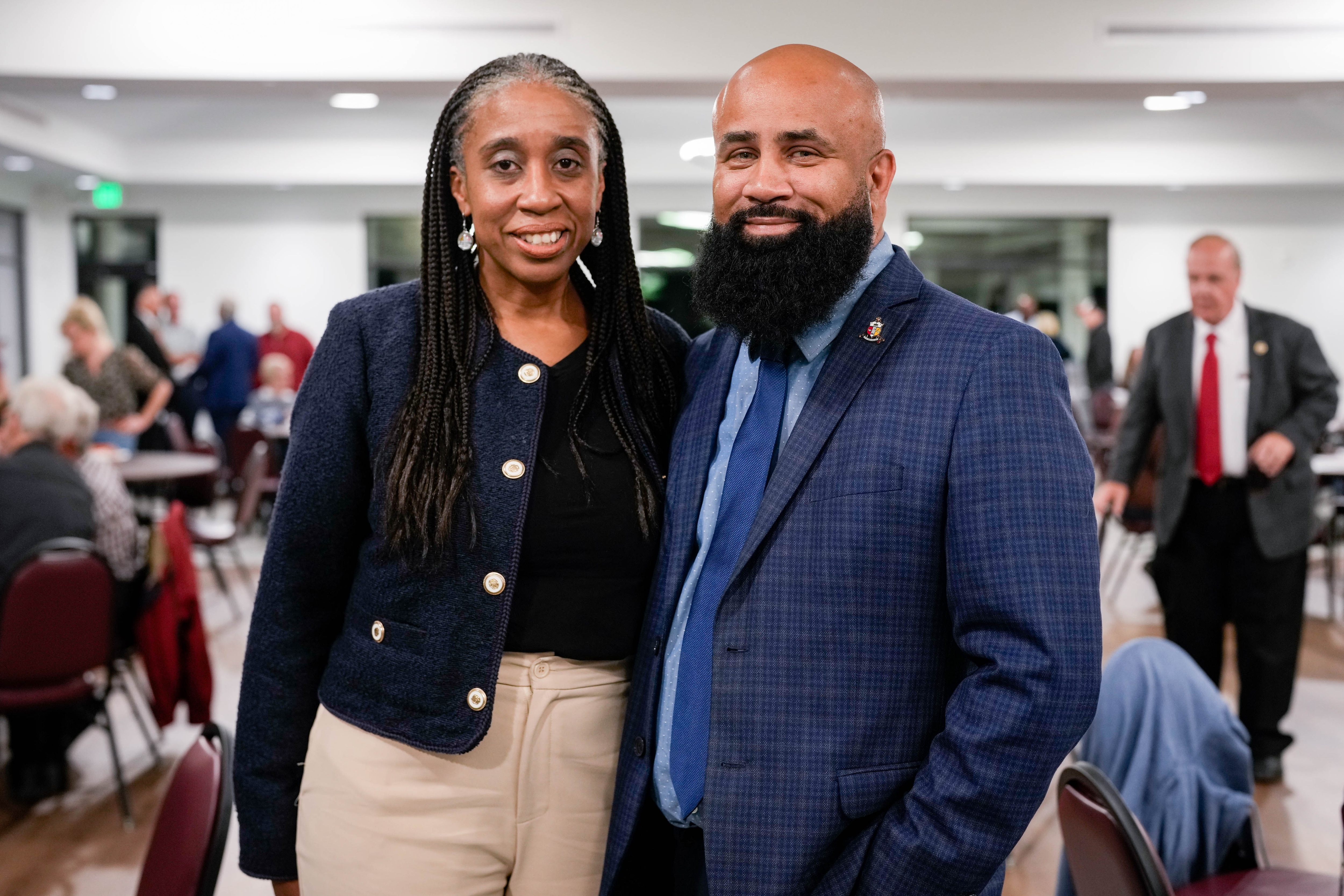 Married Democratic candidates Sharonda Dillard-Huffman and Artus Huffman attend a candidate forum last week. Dillard-Huffman is running for Baltimore County Council and Huffman is running for a seat in the Maryland House of Delegates. 