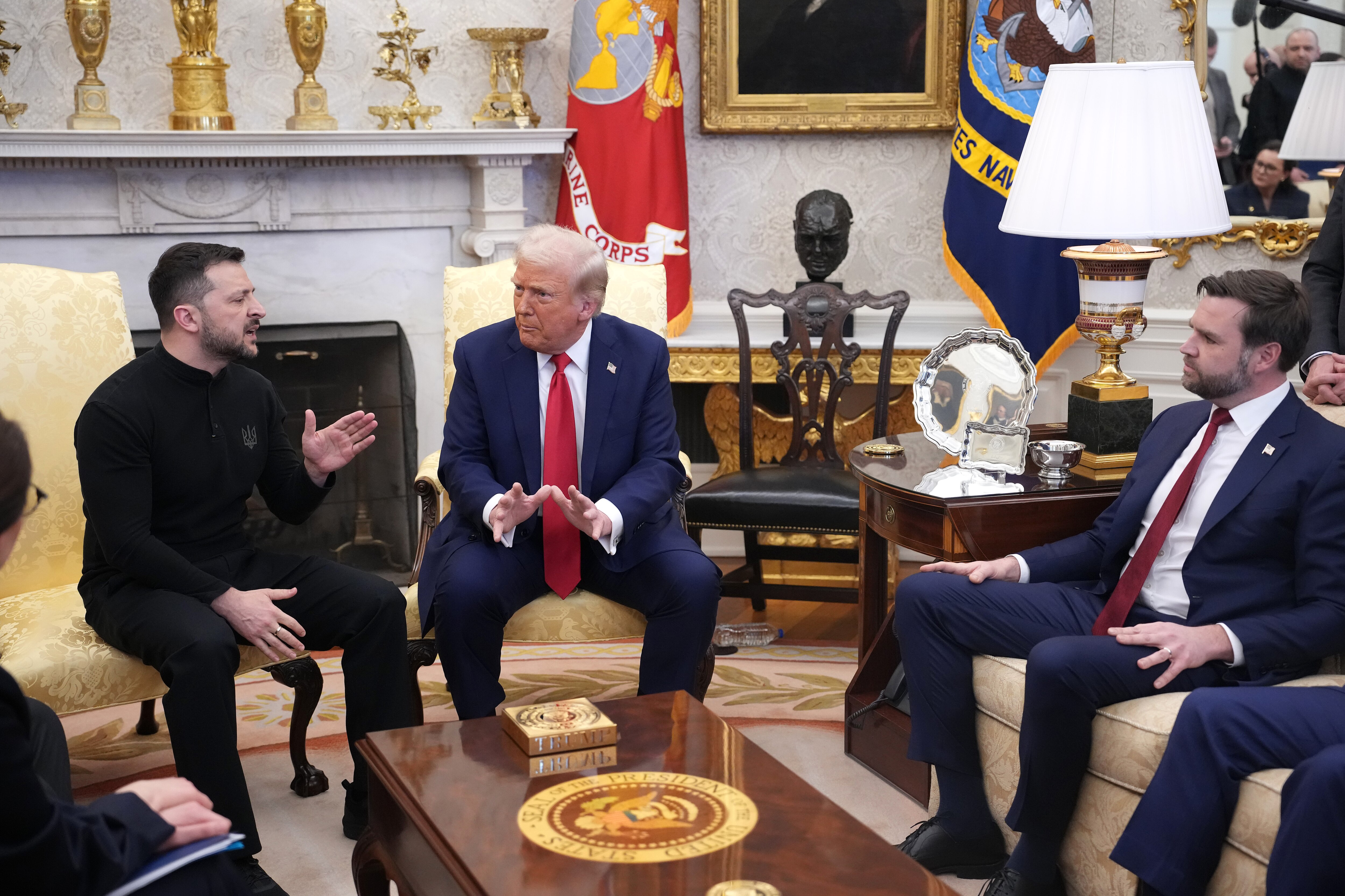 U.S. President Donald Trump, center, and Vice President JD Vance meet with Ukrainian President Volodymyr Zelensky in the Oval Office at the White House on February 28, 2025 in Washington, D.C.