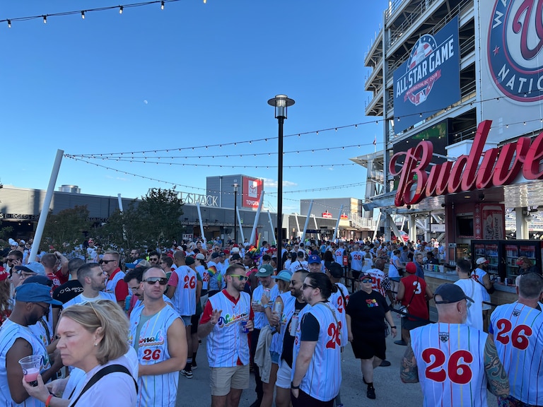 Fans wear Pride Night OUT jerseys at Nationals Park.