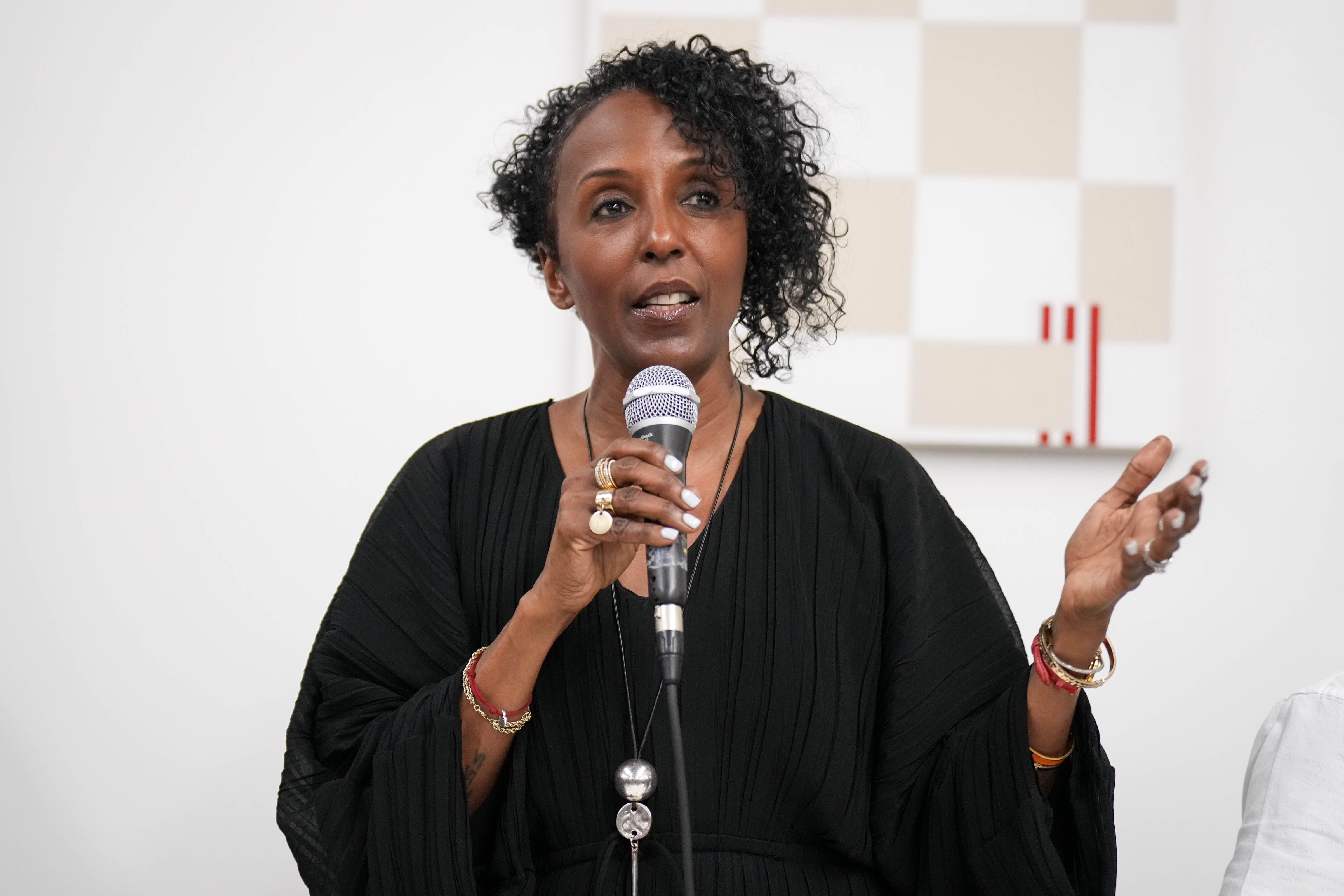 Tonya Miller Hall, pictured here giving remarks at an Inviting Light event in Station North in March, is no longer working with Mayor Brandon Scott’s office.