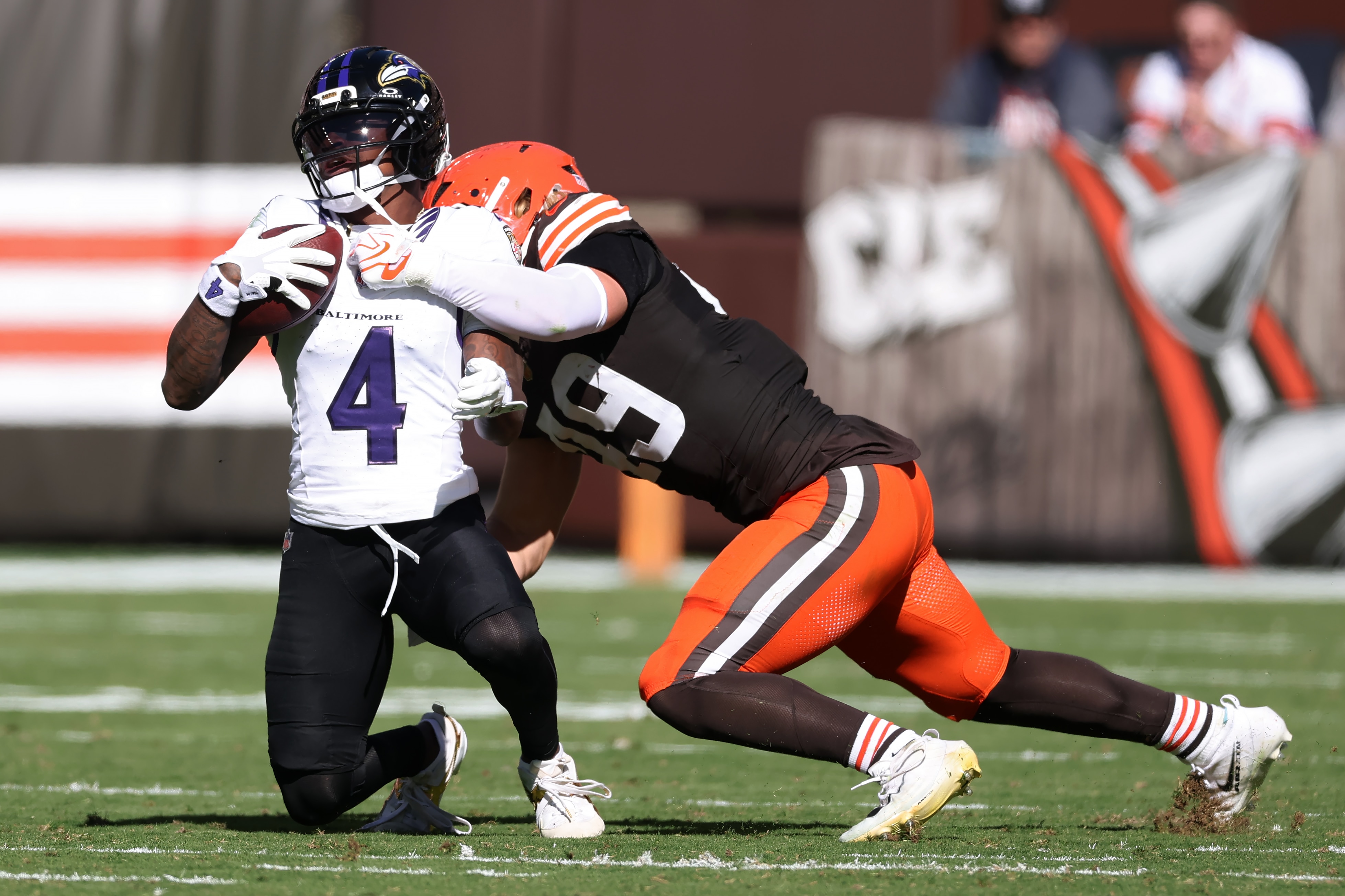 CLEVELAND, OHIO - OCTOBER 18: Carson Schwesinger #49 of the Cleveland Browns tackles Zay Flowers #4 of the Baltimore Ravens during the second quarter of the game at Huntington Bank Field on October 18, 2026 in Cleveland, Ohio. (Photo by Gregory Shamus/Getty Images)