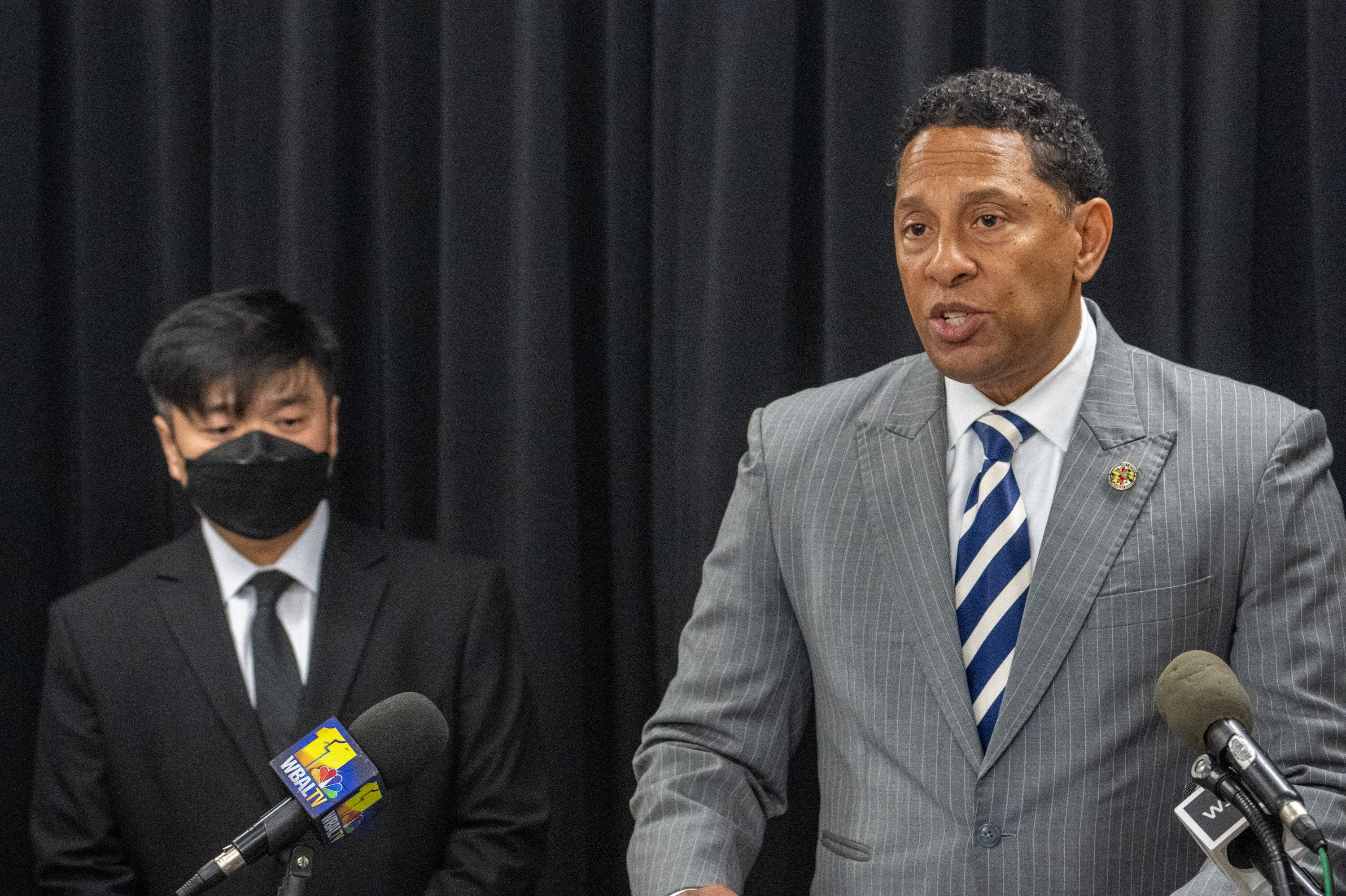 Baltimore State's Attorney Ivan Bates, right, holds a news conference after a hearing on a motion to reduce Adnan Syed's sentence under the Juvenile Restoration Act.