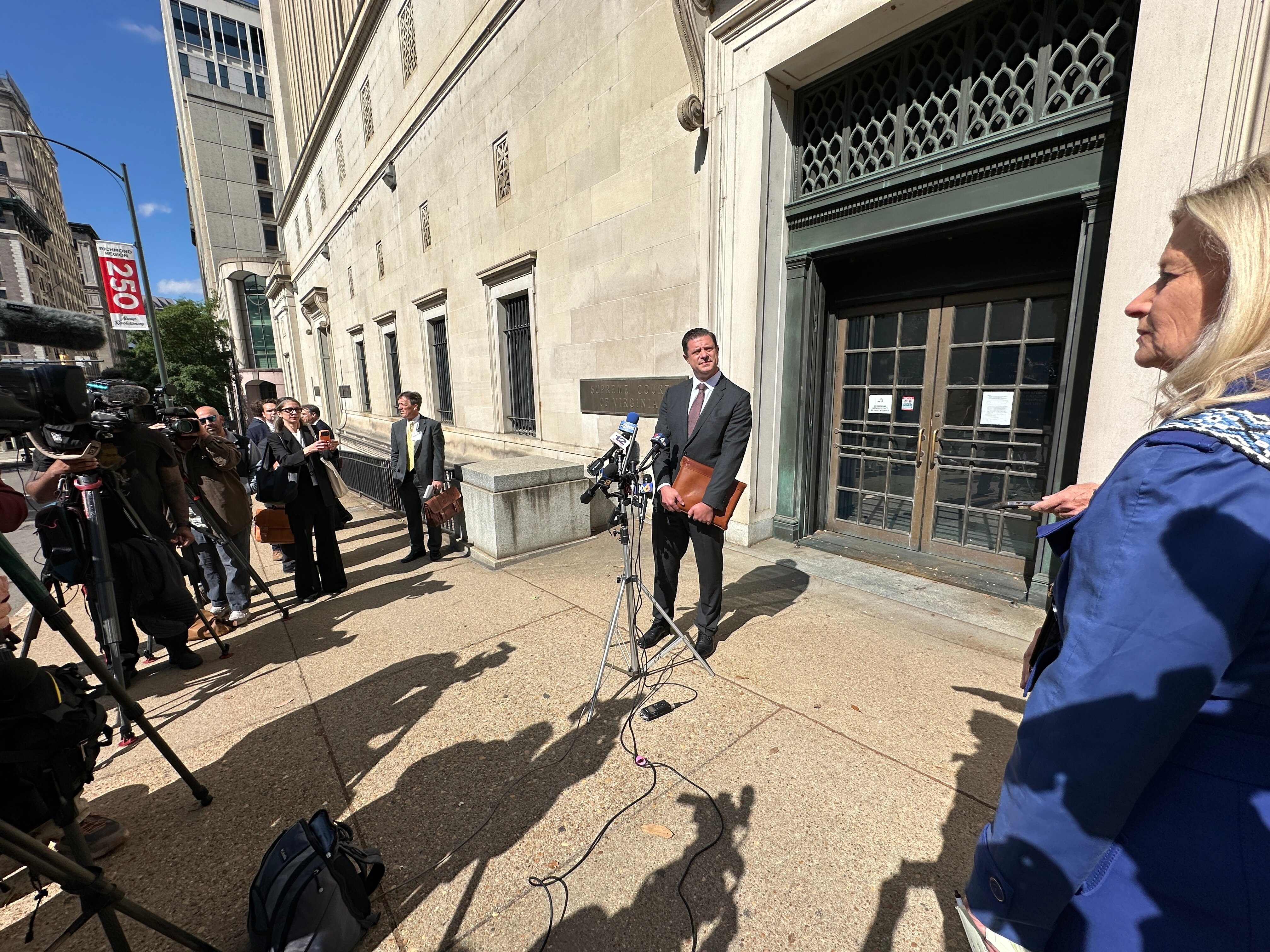 Attorney Matthew Seligman, representing Democratic state legislators, speaks with the media following a hearing on new congressional maps before the state Supreme Court in Richmond, Va. last month.