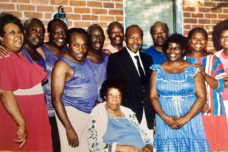 Rae Gaskins, second from left, with most of his siblings and his mother, Georgianna Gaskins.