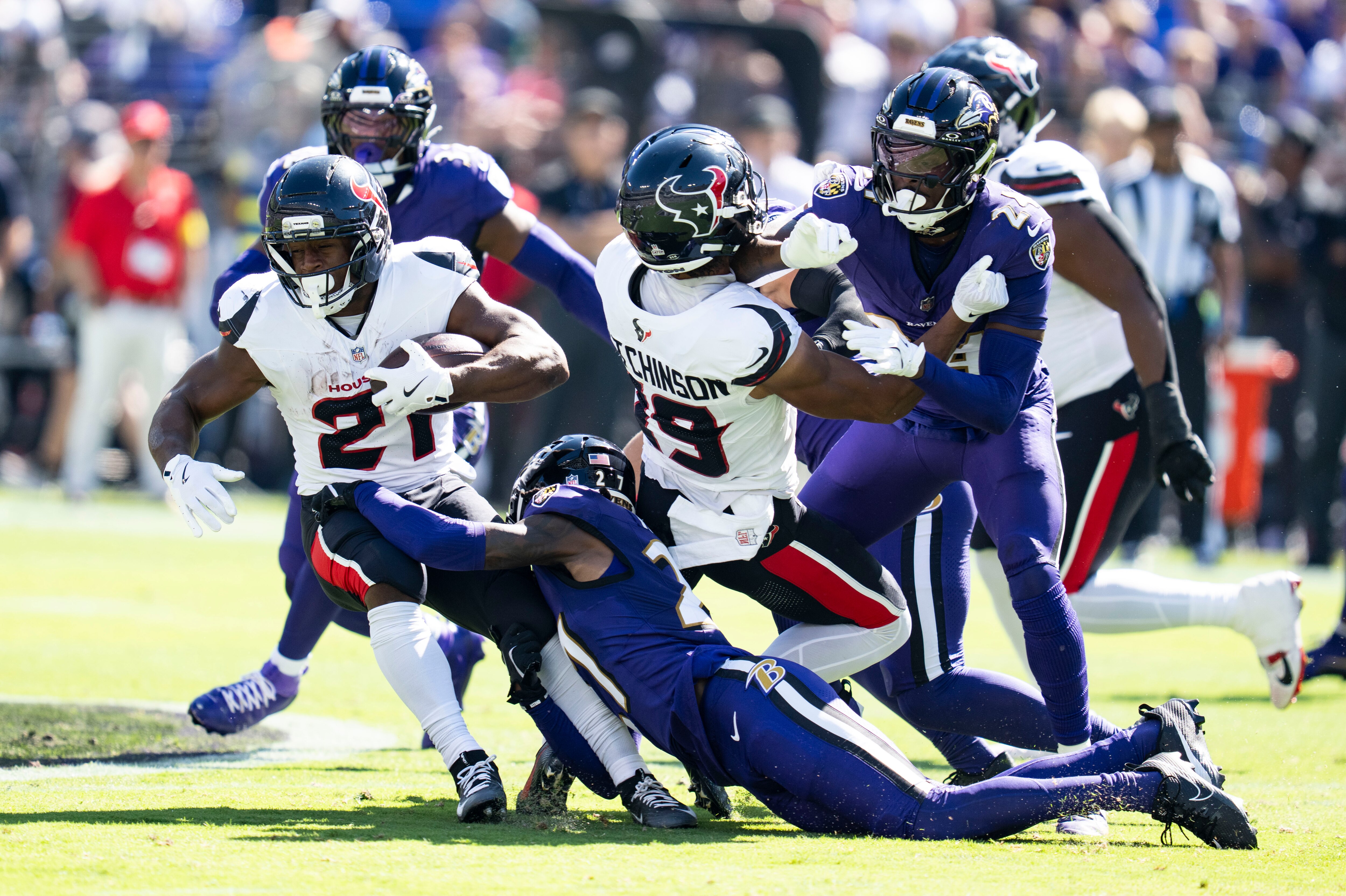 Ravens cornerback T.J. Tampa tackles Texans running back Nick Chubb in the first half of Houston’s 44-10 win Sunday.