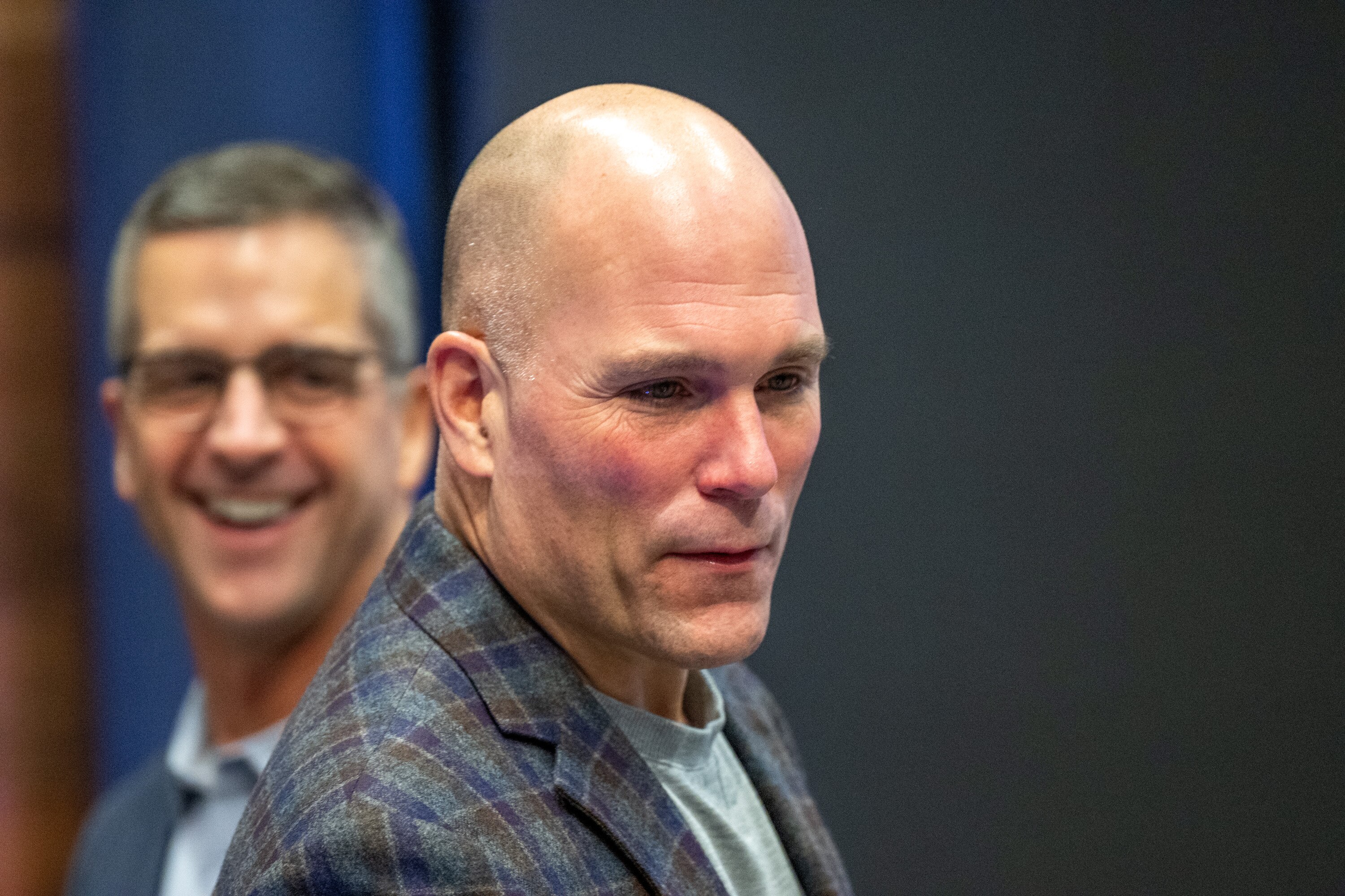 Baltimore Ravens executive vice president and general manager Eric DeCosta talks to a reporter following a season review press conference.