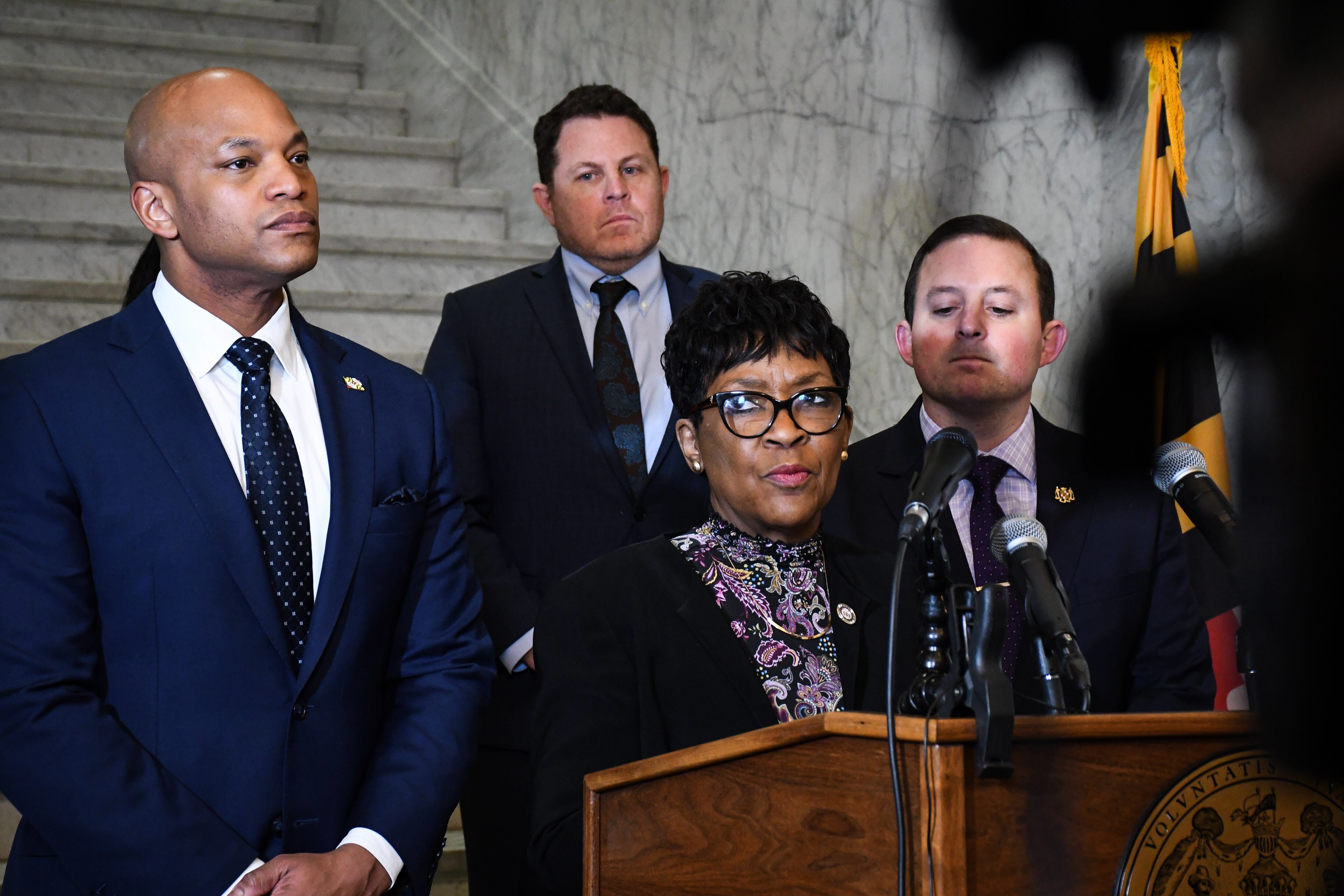 House of Delegates Speaker Adrienne A. Jones, center, speaks at a press conference about the state budget in Annapolis on Thursday.