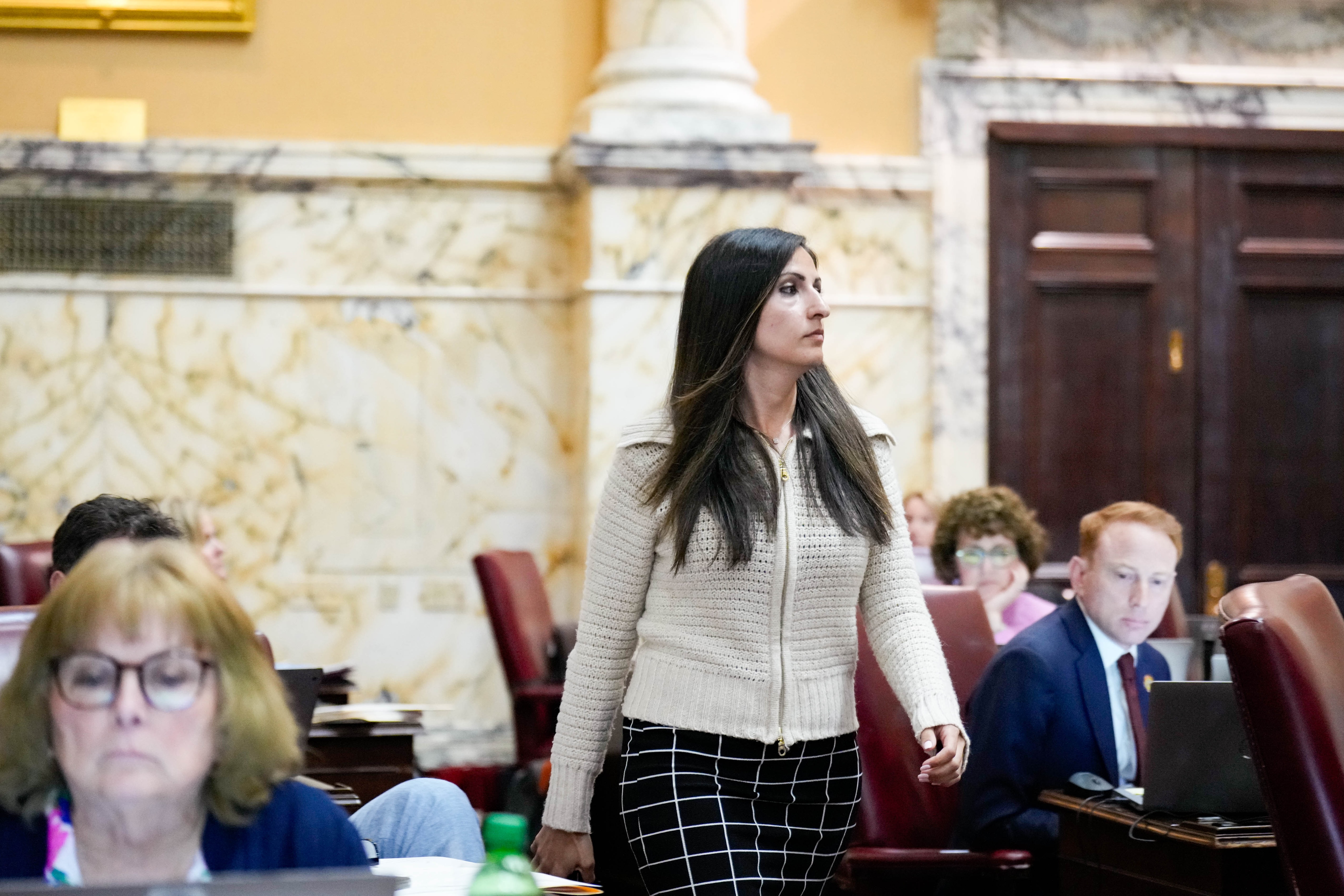 A federal judge has dismissed several charges against state Sen. Dalya Attar, who was accused of recording and attempting to extort her former campaign consultant.