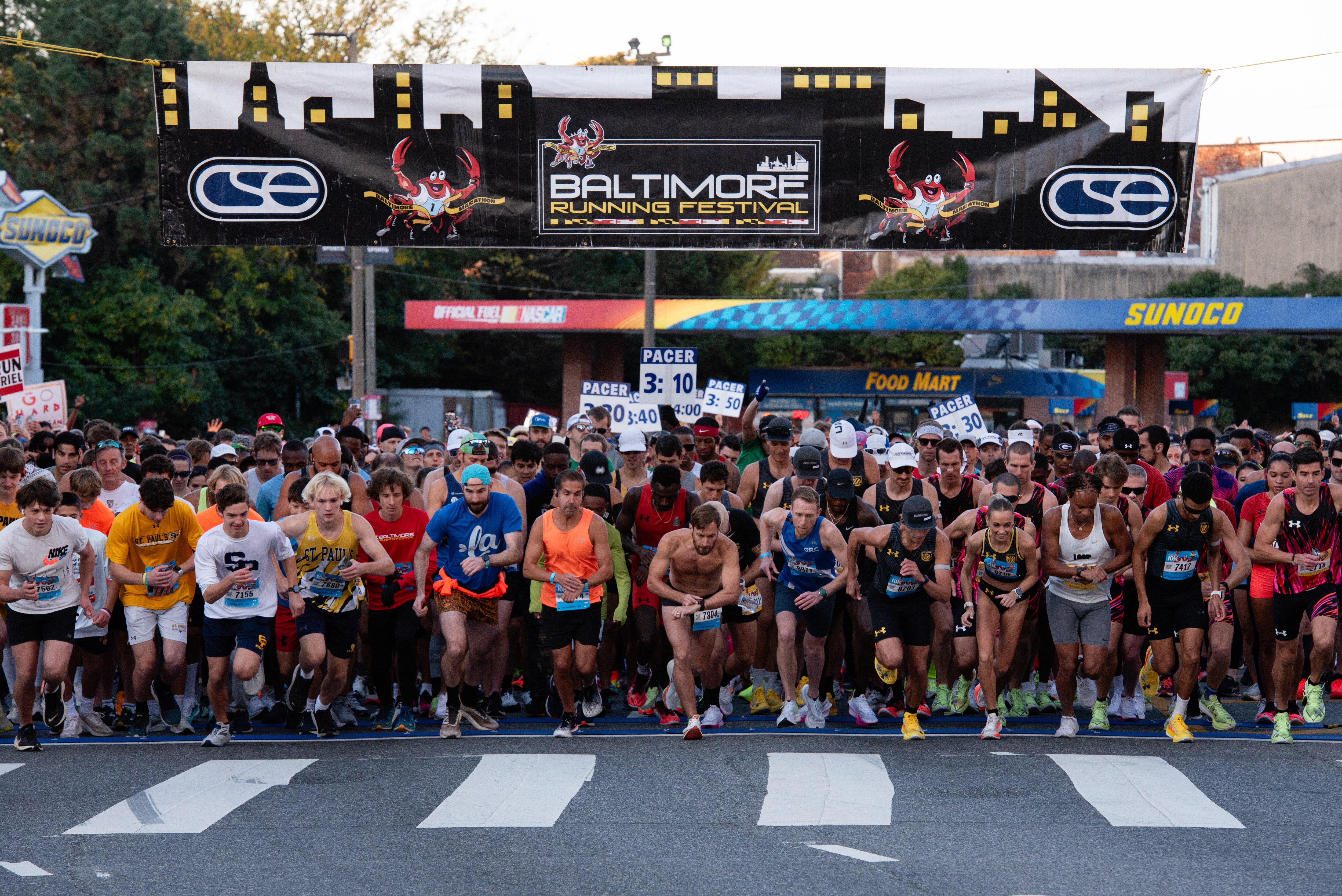 Marathon and 10K runners take off at the start of their events during the Baltimore Running Festival on October 19th, 2024 in Baltimore, MD. Eric Thompson for The Baltimore Banner.