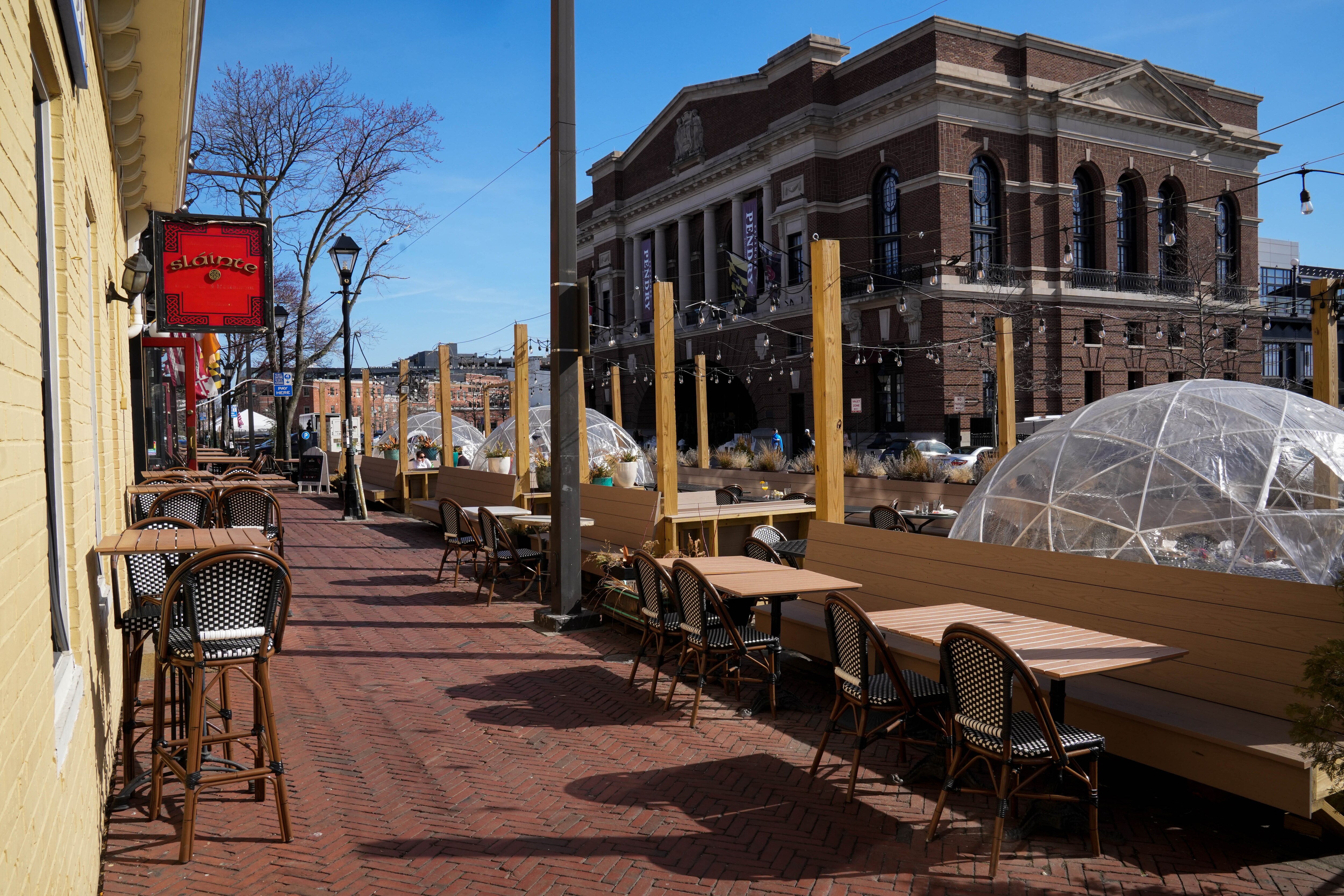 Restaurants like Sláinte along Fells Point’s waterfront have set up “parklets” for guests to enjoy outdoor dining.