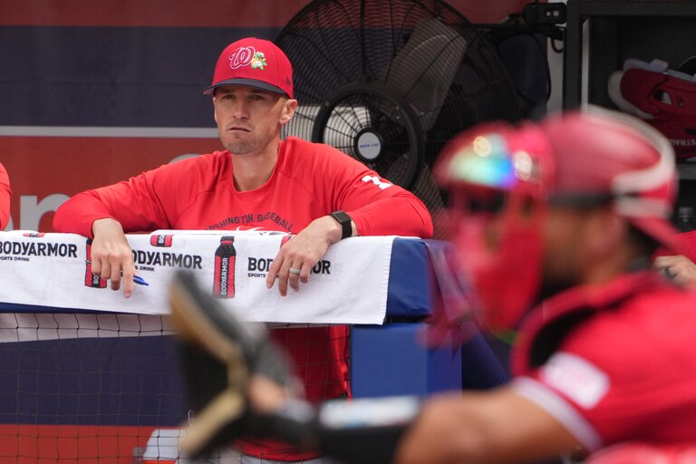 Washington Nationals manager Blake Butera watches from the dugout during the third inning of a spring training baseball game against the New York Mets Saturday, Feb. 28, 2026, in Port St. Lucie, Fla.