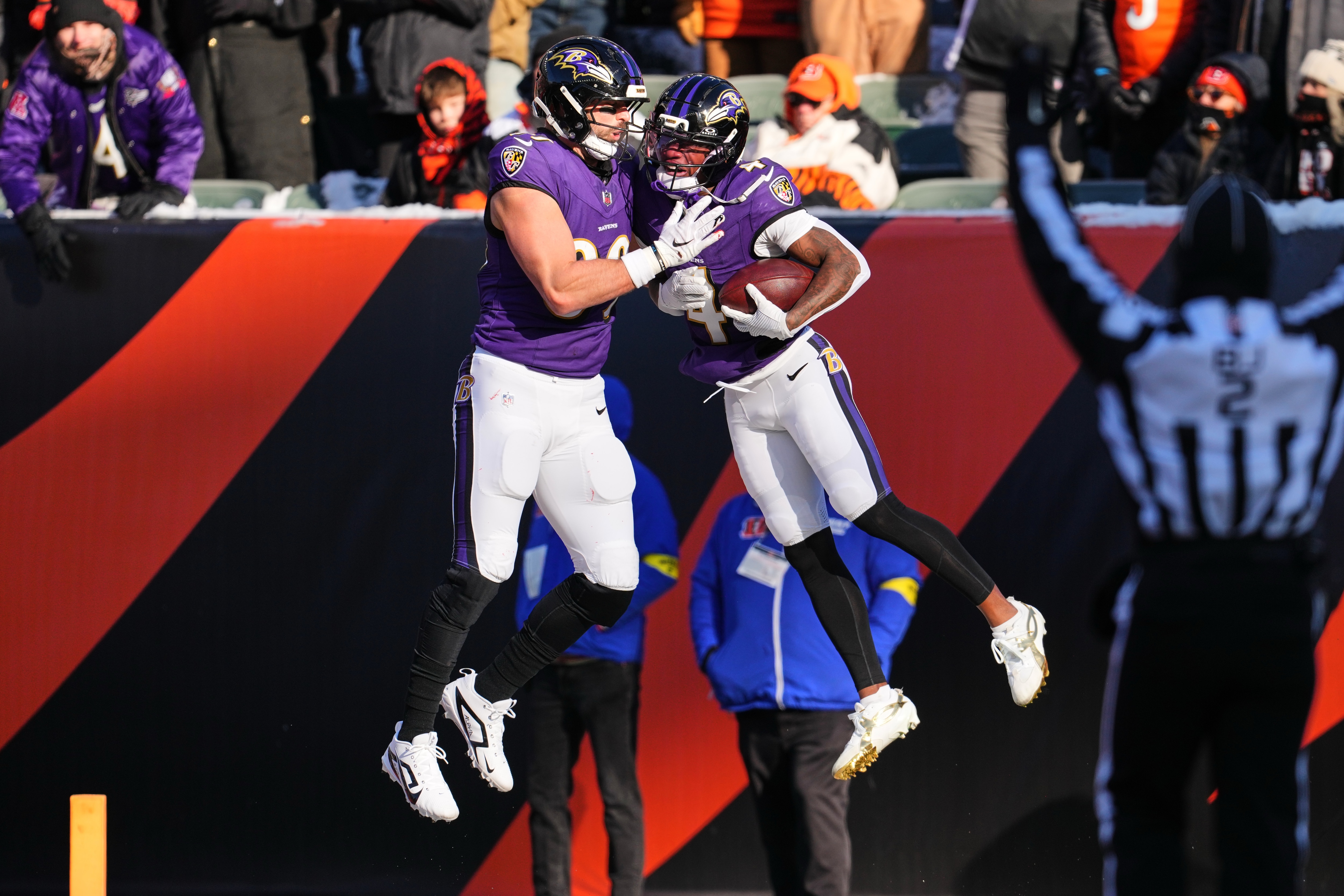 Ravens wide receiver Zay Flowers, right, celebrates with tight end Mark Andrews after scoring a touchdown during the first half Sunday against the Bengals. 