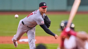Washington Nationals starting pitcher Cade Cavalli delivers during the first inning of a baseball game against the Boston Red Sox, Tuesday, June 30, 2026, in Boston. (AP Photo/Charles Krupa)
