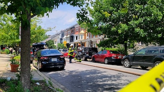 The Baltimore City Fire Department responds to a 3-alarm fire on the 2500 block of Brookfield Avenue in Reservoir Hill on Sunday.