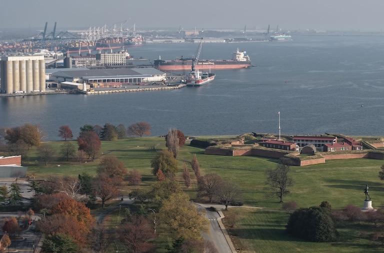 Baltimore Police block the road at East Fort Avenue leading to Fort McHenry on Friday, after sending its bomb squad as a safety measure after crews dug up an old explosive device.