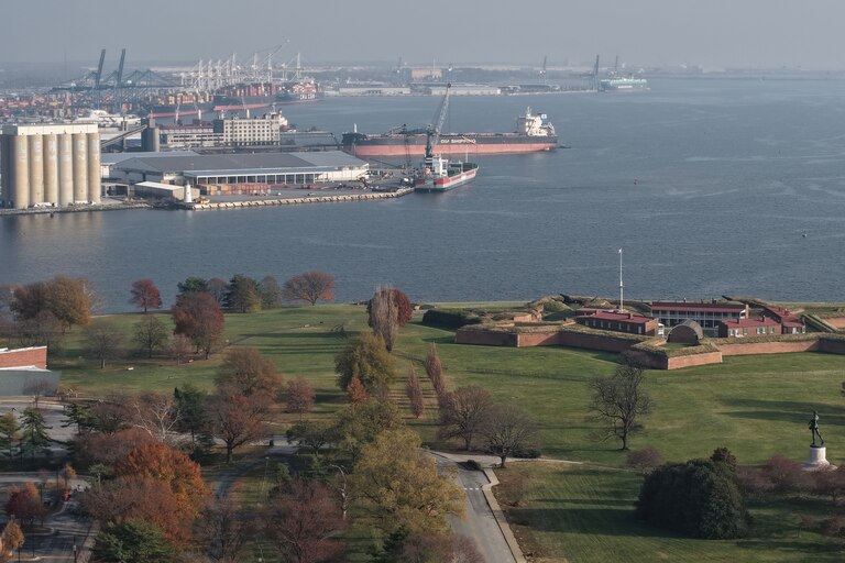 Baltimore Police block the road at East Fort Avenue leading to Fort McHenry on Friday, after sending its bomb squad as a safety measure after crews dug up an old explosive device.
