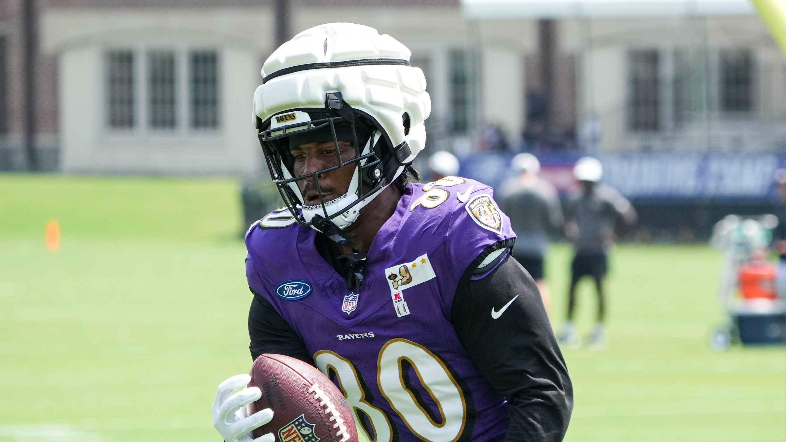 Baltimore Ravens tight end Isaiah Likely (80) runs a drill during the team’s training camp practice at the Under Armour Performance Center in Owings Mills on Tuesday, August 6, 2024.