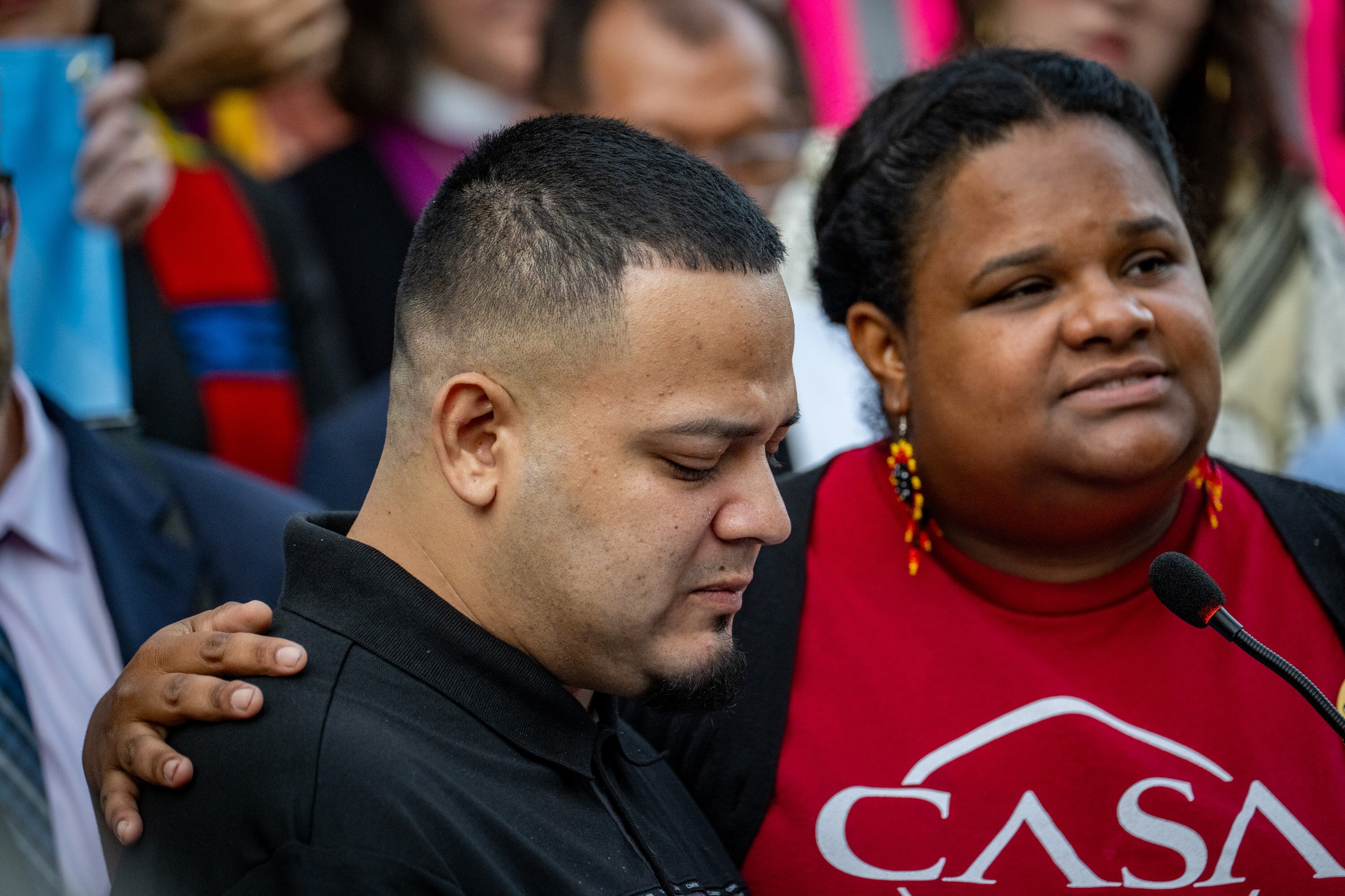 Kilmar Abrego Garcia is comforted by CASA member Lydia Walther-Rodriguez during a press conference outside the George H. Fallon Federal Building in downtown Baltimore last month.
