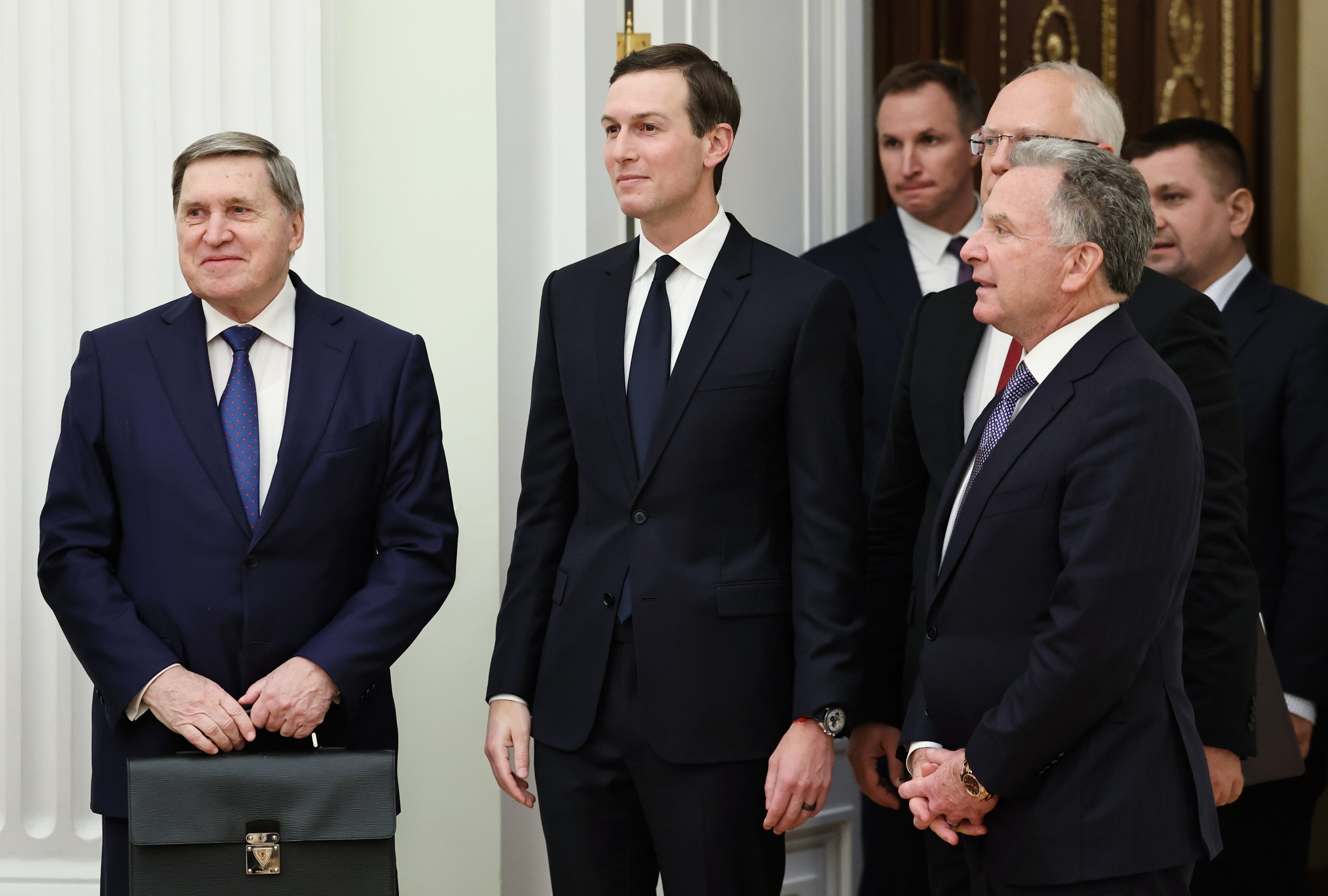 Russian Presidential foreign policy adviser Yuri Ushakov, left, U.S. President Donald Trump's son-in-law Jared Kushner, center, U.S. special envoy Steve Witkoff, foreground right, and Russian Direct Investment Fund CEO Special Presidential Representative for Investment and Economic Cooperation with Foreign Countries Kirill Dmitriev, behind Witkoff, arrive to attend talks with Russian President Vladimir Putin at the Senate Palace of the Kremlin in Moscow, Russia, Dec. 2, 2025.
