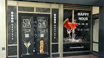 Signage for STK covers the doors of 1 E. Pratt St. on June 5, 2026.