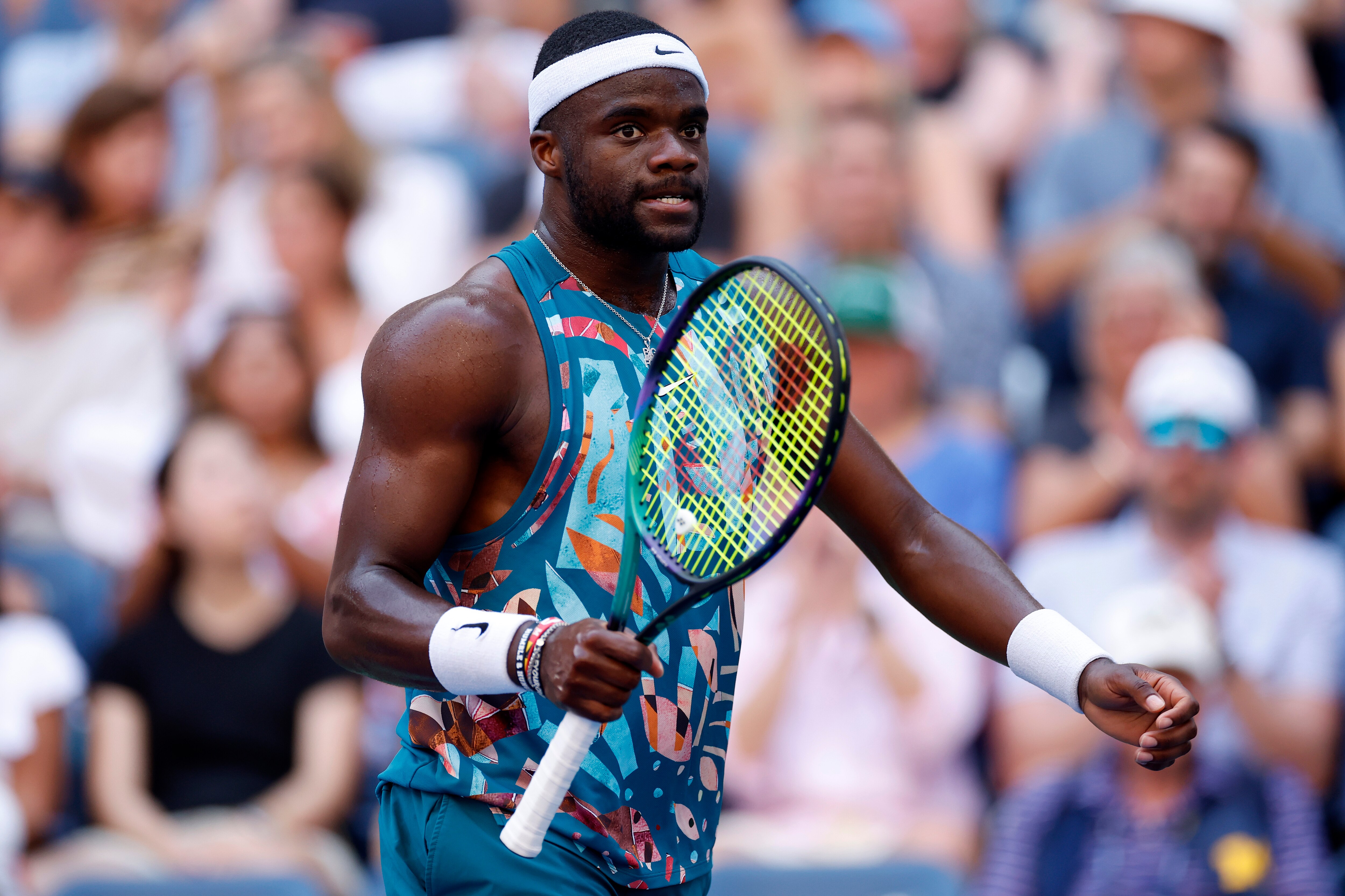 NEW YORK, NEW YORK - SEPTEMBER 03: Frances Tiafoe of the United States reacts against Rinky Hijikata of Australia during their Men's Singles Fourth Round match on Day Seven of the 2023 US Open at the USTA Billie Jean King National Tennis Center on September 03, 2023 in the Flushing neighborhood of the Queens borough of New York City. (Photo by Sarah Stier/Getty Images)