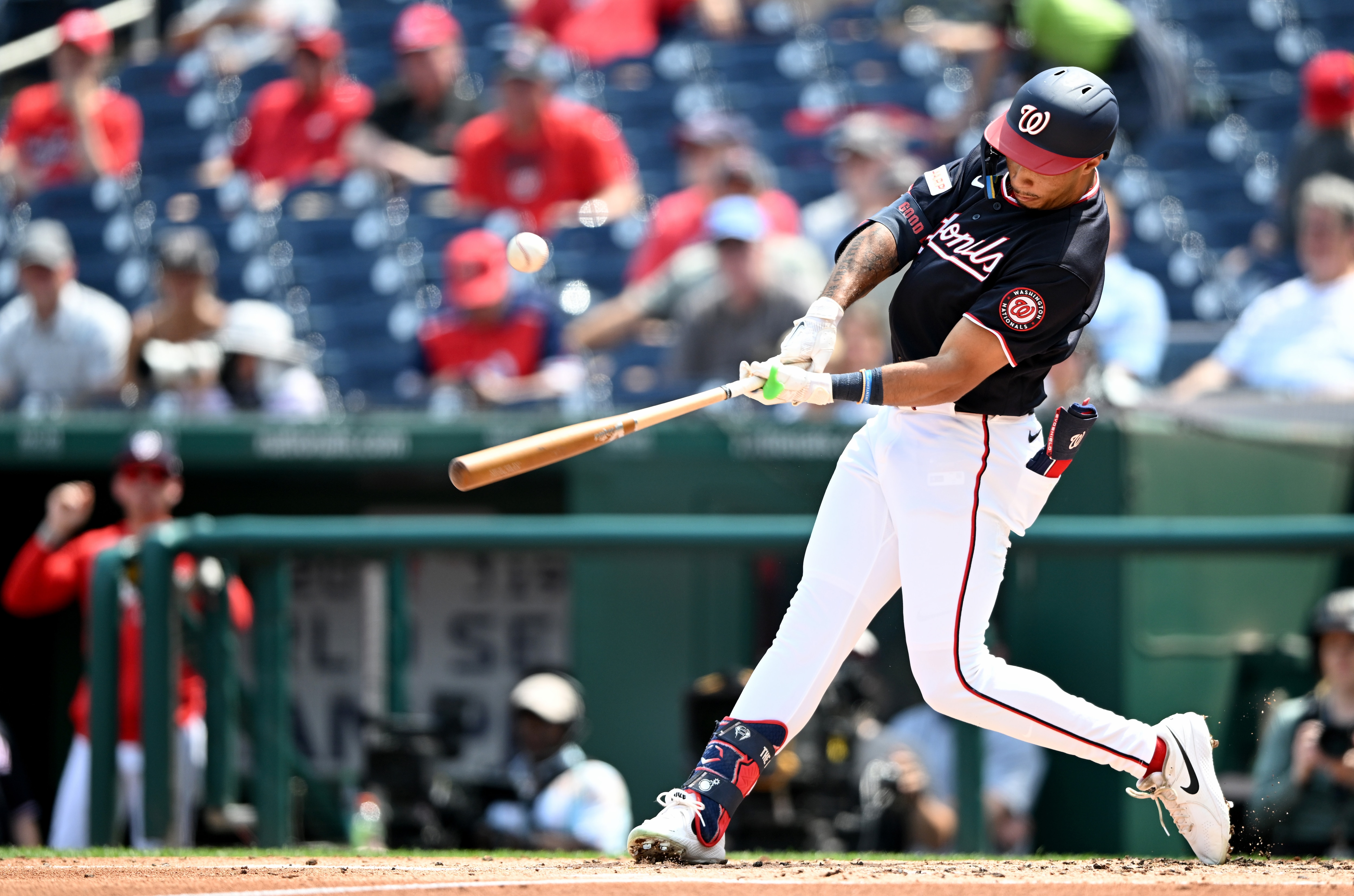 Daylen Lile drives in a run with a single in the first inning Thursday during the Nationals’ 7-1 win over the Rockies.