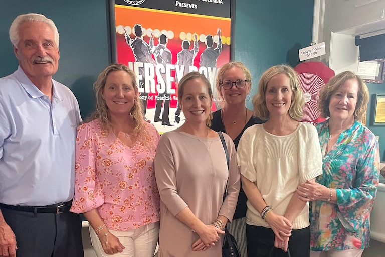 Katie Filling with her sisters and parents last year at Toby's Dinner Theater in Columbia.