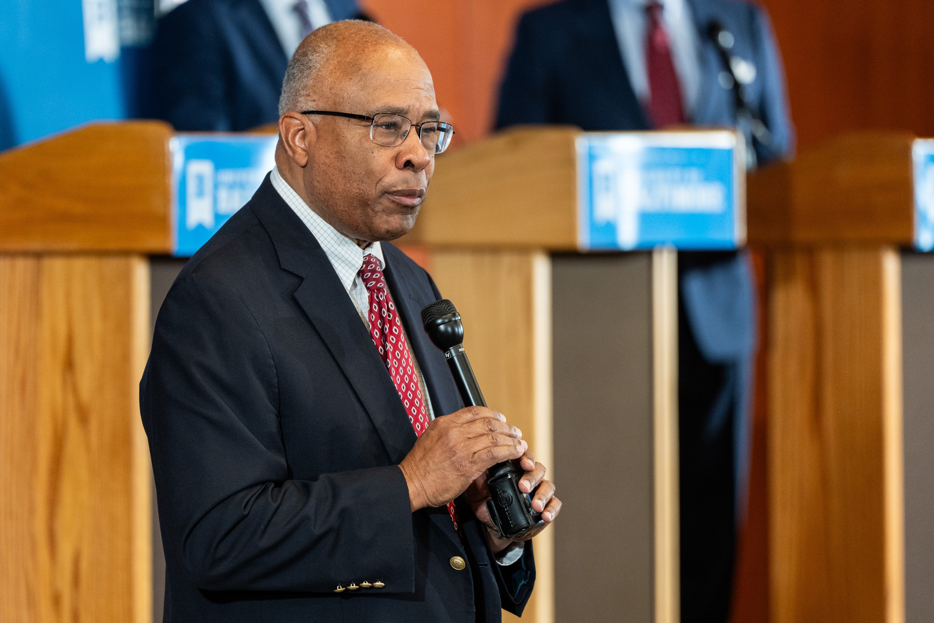 University of Baltimore President Kurt Schmoke speaks ahead of a mayoral debate held at at the school’s H. Mebane Turner Learning Commons on April 30, 2024.