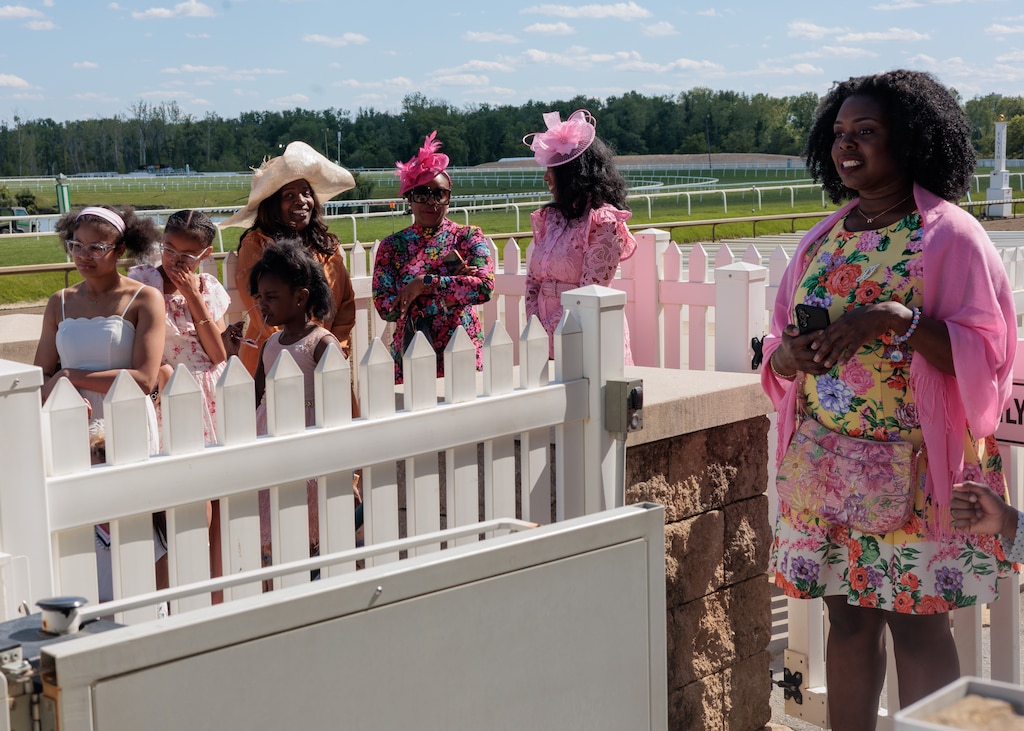 A group gets a tour of the winners circle at Laurel Park Race Track.