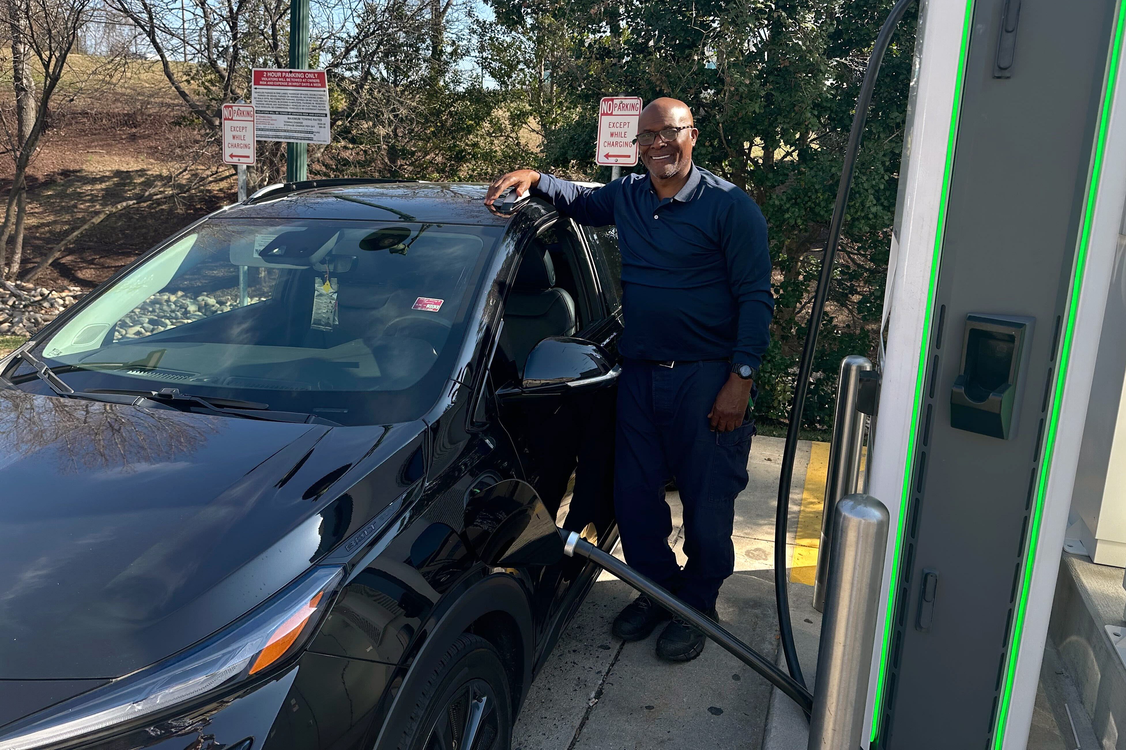 MARCH 10, 2026 - Given high prices and long lines at local gas stations, Johnnie Bennett of Gaithersburg is especially grateful to be driving an electric vehicle, a 2022 Chevy Volt.