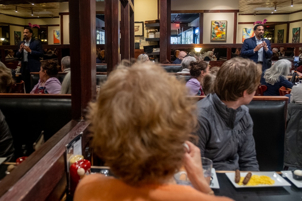 Will Jawando, one of three County Council members who is running for County Executive in an upcoming election in Montgomery County, addresses the District 18 Breakfast Club at Parkway Deli in Silver Spring, Maryland.