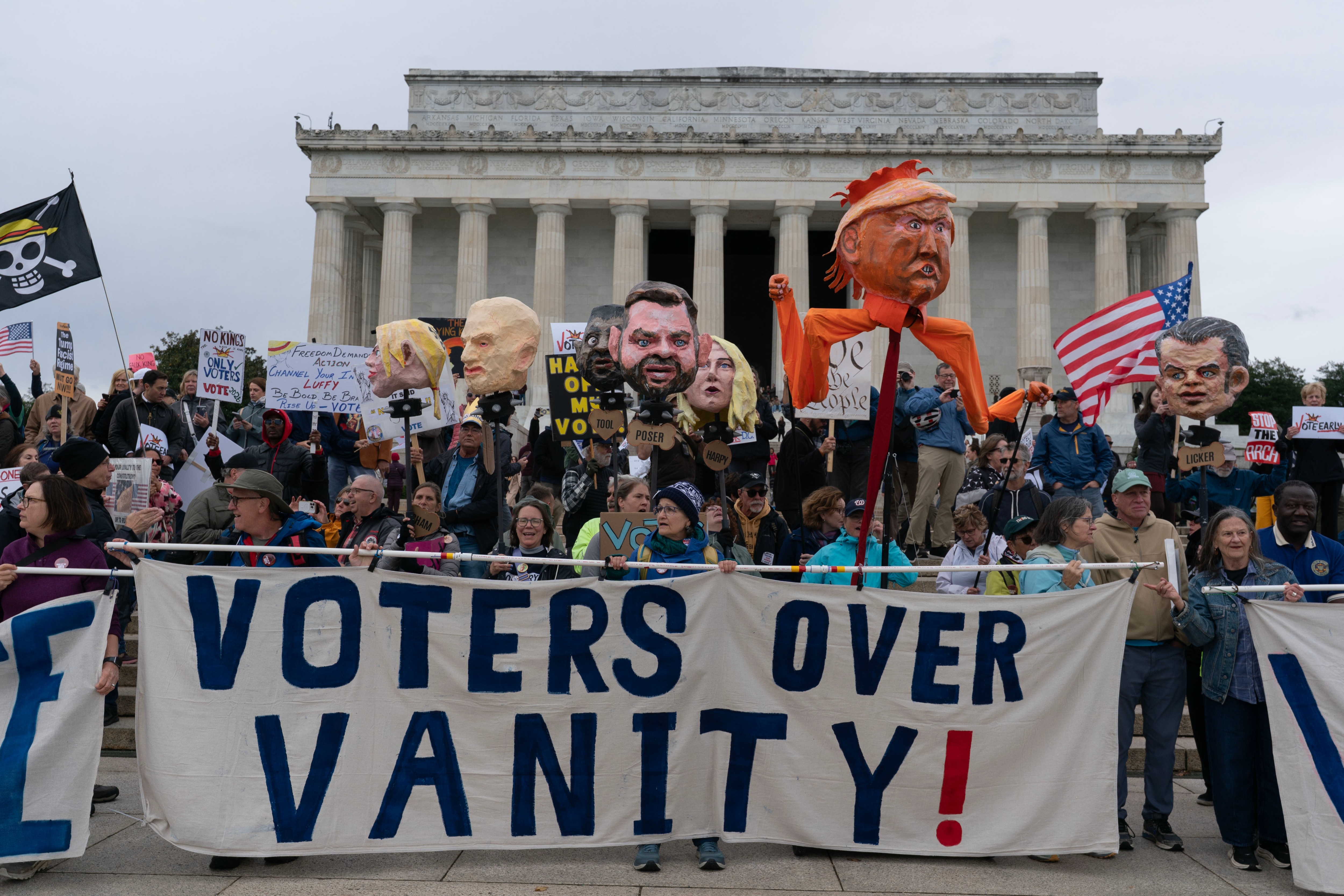 Demonstrators rally at the Lincoln Memorial during a "No Kings" protest in Washington, Saturday, Oct. 17, 2026. (AP Photo/Jose Luis Magana)