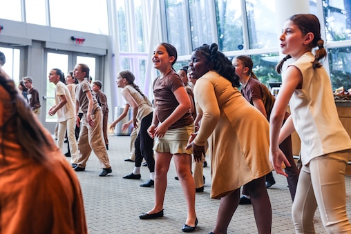 Students from Young Artists of America Kids perform at Strathmore Music Center in Silver Spring, Md.