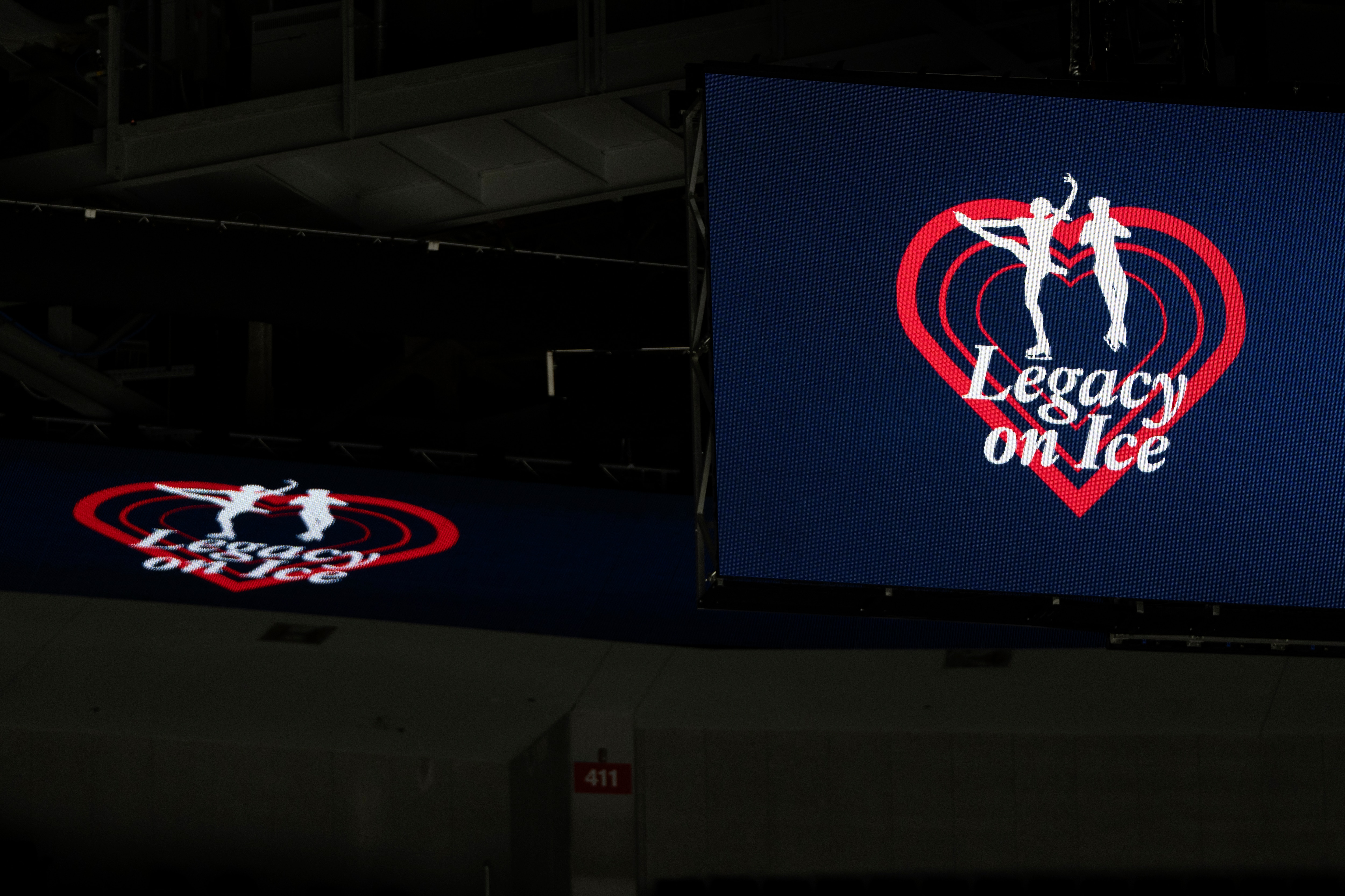 The logo for the Legacy on Ice skating event, organized to honor figure skaters and coaches who died in the recent plane crash at Reagan National Airport, is displayed at Capital One Arena on Monday, Feb. 17, 2025, in Washington. (AP Photo/Mark Schiefelbein)