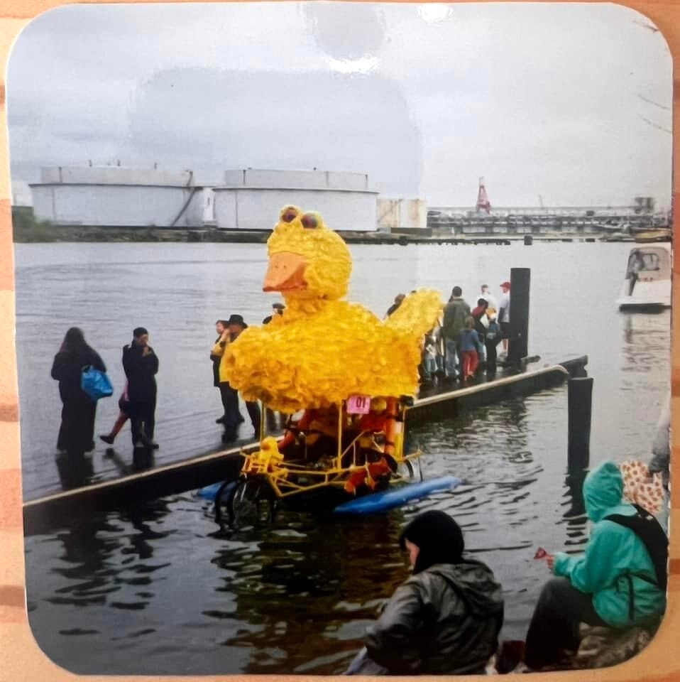 The Catholic Community School team of Daley the Duck waits on the shore while the teachers completed the Canton Waterfront Park obstacle. (Photo courtesy of Stephanie McNulty, May 2003)