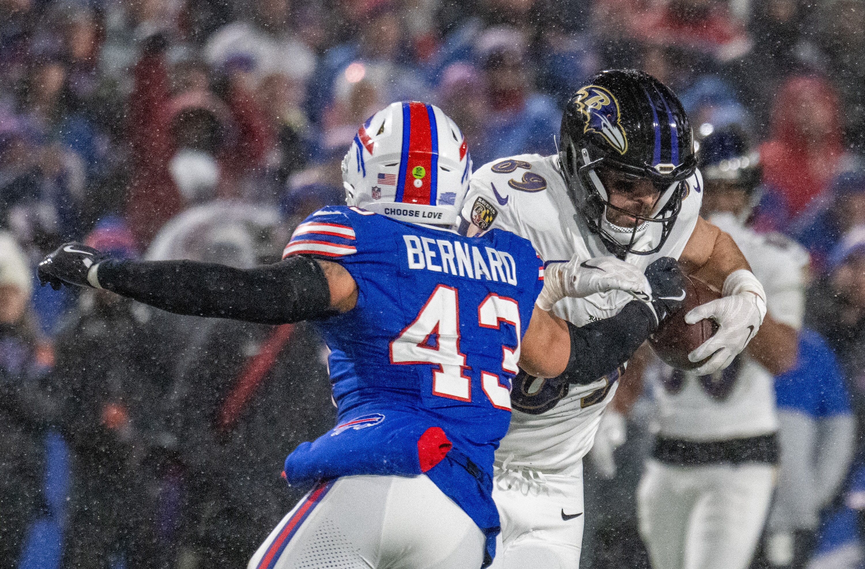 Buffalo Bills linebacker Terrel Bernard (43) punches the ball from Baltimore Ravens tight end Mark Andrews (89) causing a fumble in the 4th quarter. The Baltimore Ravens lost to the Buffalo Bills 27 - 25  in the AFC divisional round at Highmark Stadium in Orchard Park, New York, on Sunday January 19, 2025.