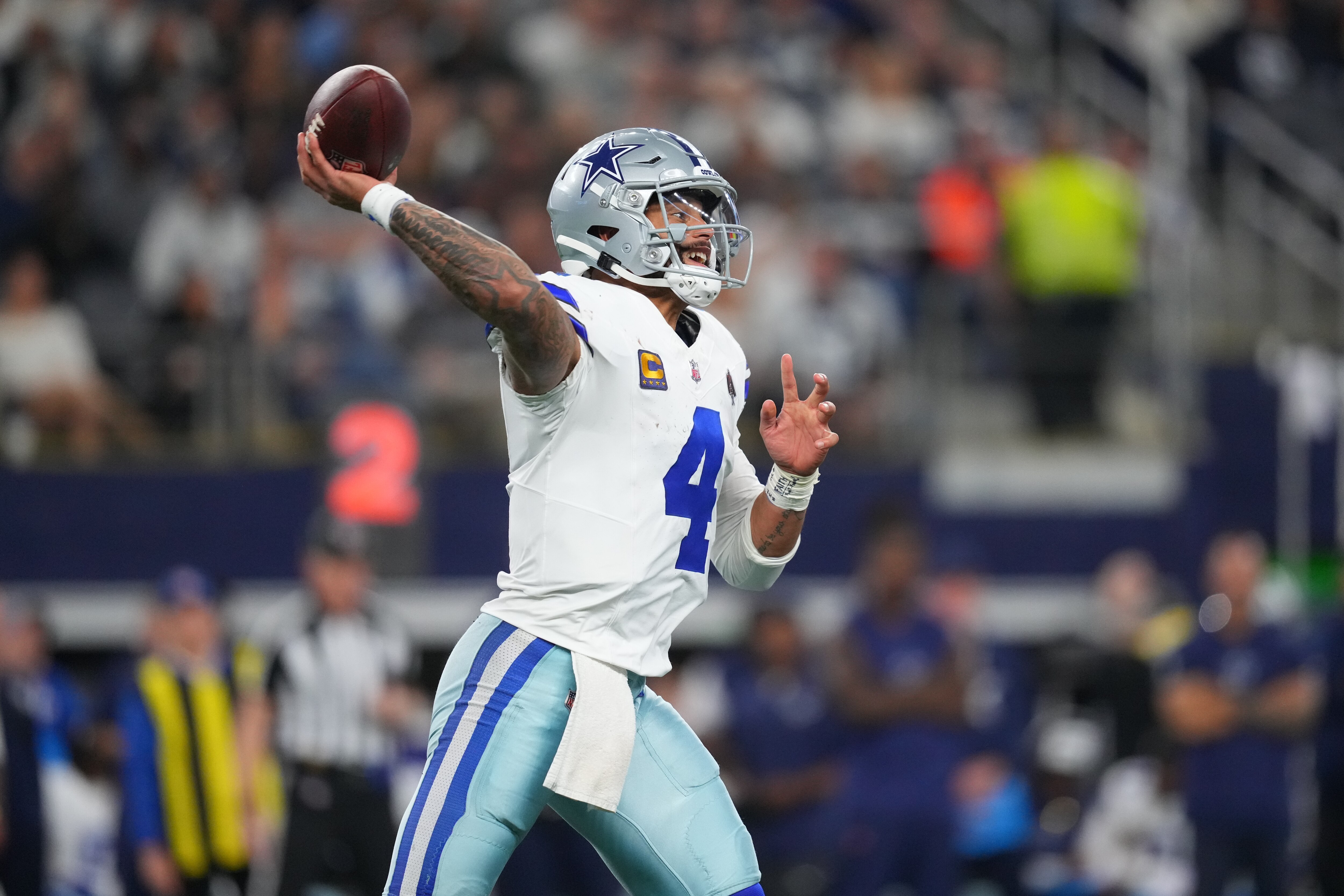 Dallas Cowboys quarterback Dak Prescott (4) throws during an NFL football game between the Dallas Cowboys and the Minnesota Vikings Sunday, Dec. 14, 2025, in Arlington, Texas. (AP Photo/Julio Cortez)