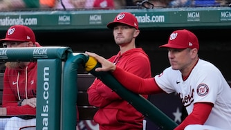 Washington Nationals manager Blake Butera, center, looks on during the third inning of Tuesday's game against the Philadelphia Phillies.