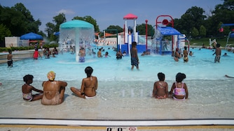 Families brought their children to cool down at Druid Hill Park Swimming Pool in Baltimore, MD on June 23, 2025.