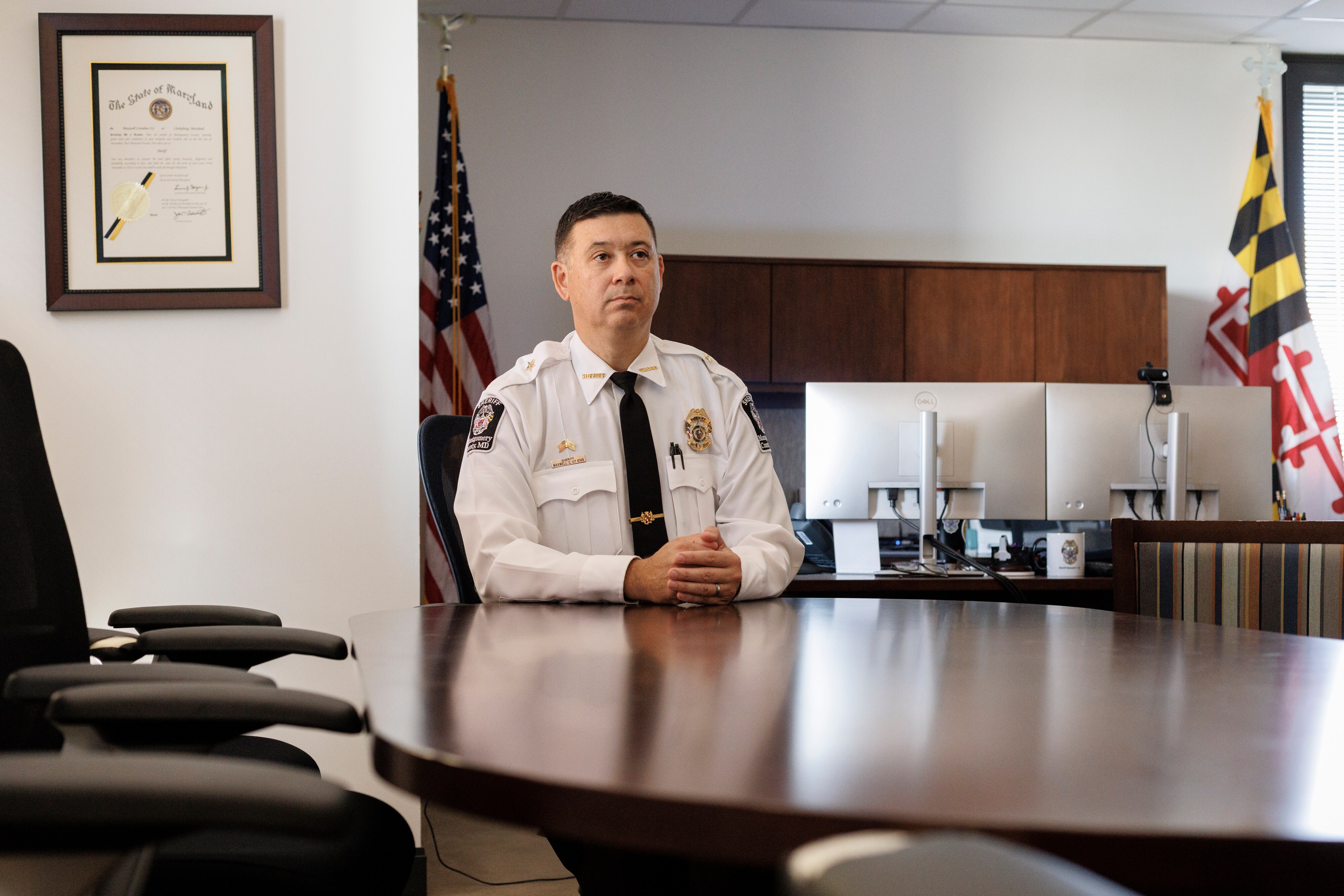 Maxwell Uy, who became Montgomery County’s first Asian American sheriff in 2022, poses for a portrait in his Rockville, Md., office on Friday, September 12, 2025. Uy is seeking reelection amid staffing shortages and department turnover. His challenger, Will Milam, argues the agency has become a “toxic environment” under Uy’s leadership.