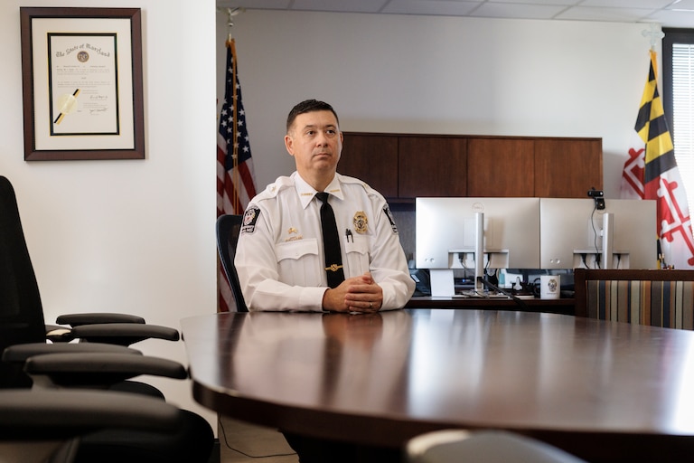 Maxwell Uy, who became Montgomery County’s first Asian American sheriff in 2022, poses for a portrait in his Rockville, Md., office on Friday, September 12, 2025. Uy is seeking reelection amid staffing shortages and department turnover. His challenger, Will Milam, argues the agency has become a “toxic environment” under Uy’s leadership.