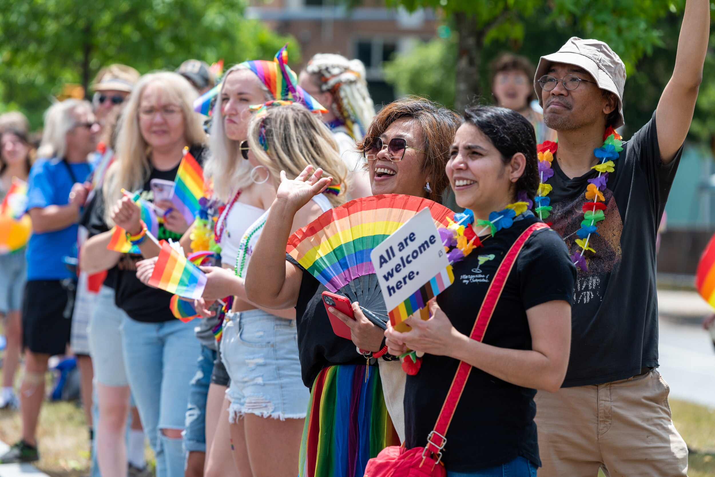Ucu Agustimi, center with fan, at the Baltimore Pride Parade in June.