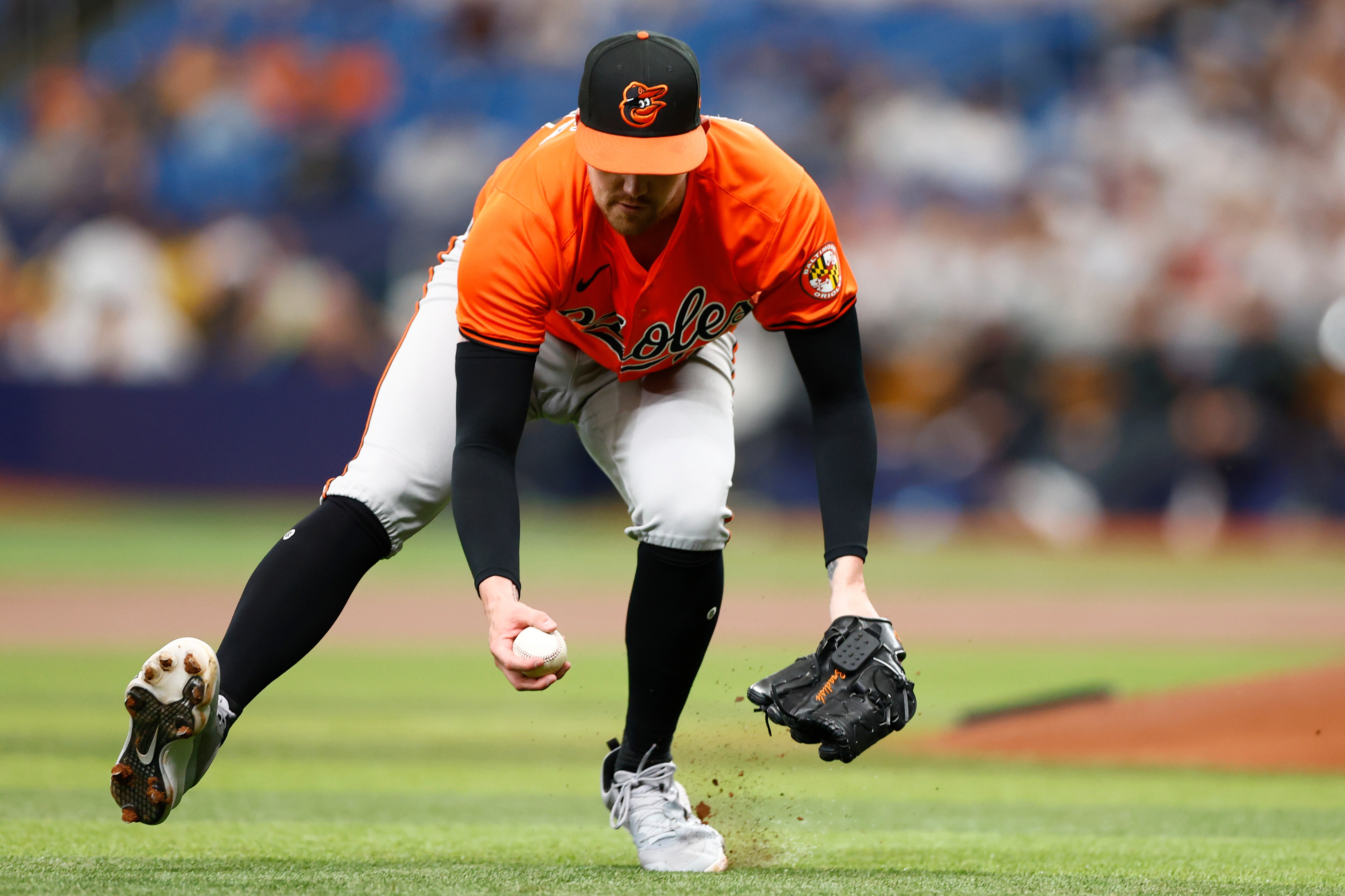 Kyle Bradish fields the dribbler by Yandy Díaz in the first inning that was the only hit Bradish allowed Saturday in a 5-0 win over the Rays.