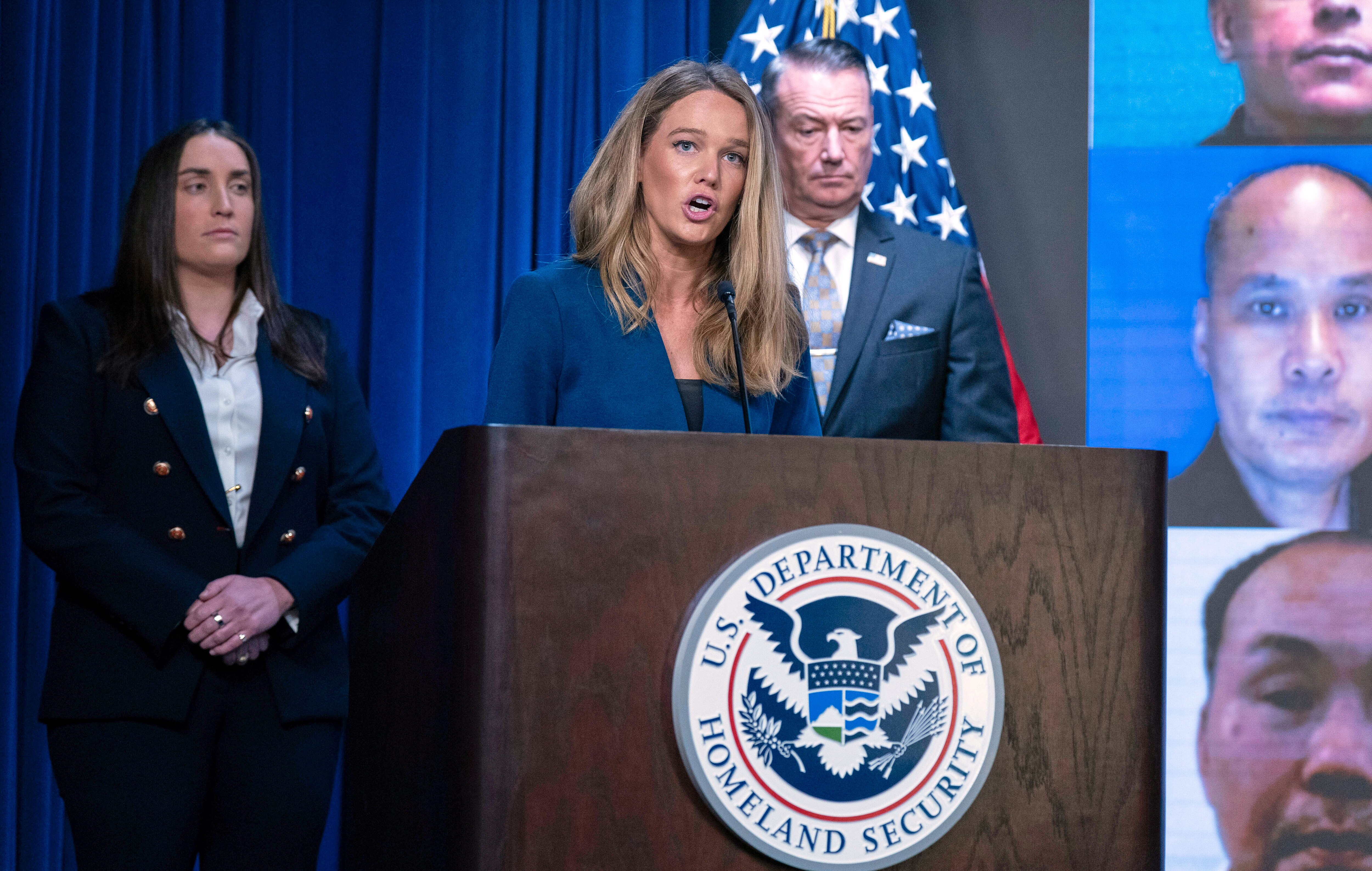 DHS Assistant Secretary for Public Affairs Tricia McLaughlin, flanked by Deputy director of U.S. Immigration and Customs Enforcement Madison Sheahan, left, and Acting director of U.S. Immigration and Customs Enforcement Todd Lyons, speaks during a news conference at ICE Headquarters, in Washington, Wednesday, May 21, 2025. (AP Photo/Jose Luis Magana)