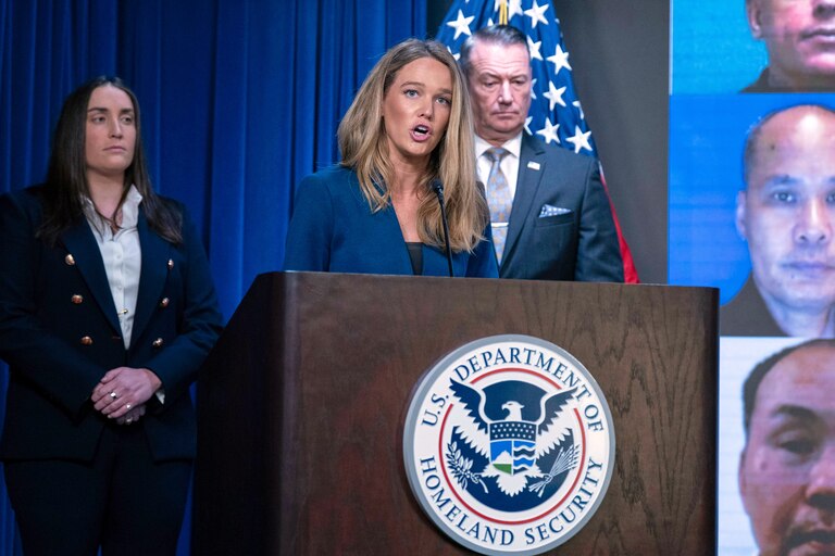 DHS Assistant Secretary for Public Affairs Tricia McLaughlin, flanked by Deputy director of U.S. Immigration and Customs Enforcement Madison Sheahan, left, and Acting director of U.S. Immigration and Customs Enforcement Todd Lyons, speaks during a news conference at ICE Headquarters, in Washington, Wednesday, May 21, 2025. (AP Photo/Jose Luis Magana)