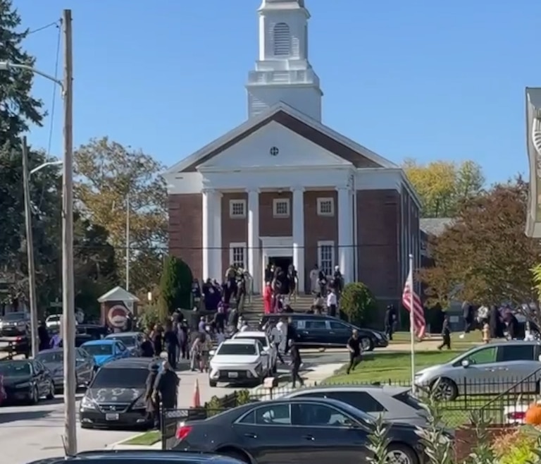 Screenshot from Ring camera footage shooting a funeral on West Overlea Avenue that broke out into a large melee and ended with a 25-year-old man being shot in front of a church on Saturday, Oct. 24, 2026.